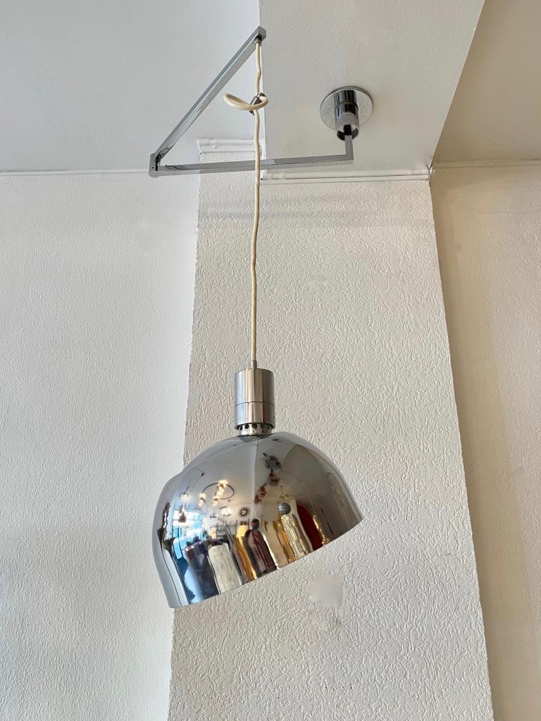 This well-constructed pendant lamp is part of a series named ‘AM/AS’ that included table, wall, ceiling and suspension lamps, and were designed by an influential Italian trio Franco Albini, Franc Helg and Antonio Piva for Sirrah in 1969. This