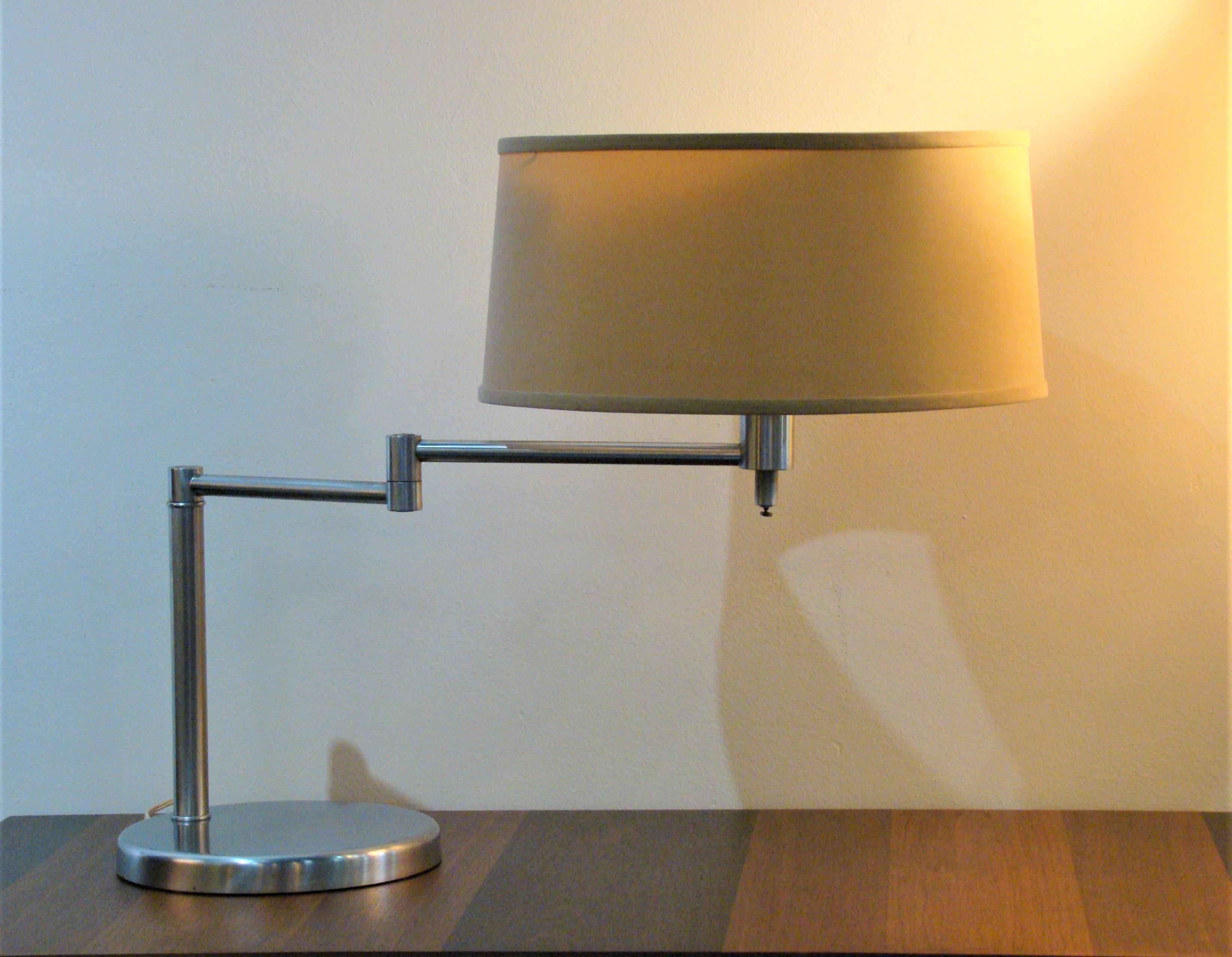 Vintage (c.1970's) swing-arm lamp manufactured by the Laurel Lamp Company, the design is after and attributed to Walter Von Nessen. Constructed of brushed nickel the lamp is solid, functions well and is in good overall condition with some surface