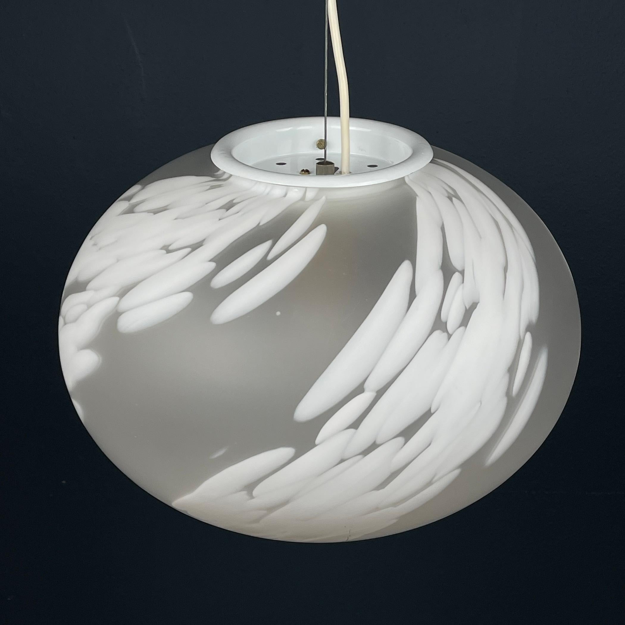 Introducing this exquisite vintage swirl Murano lamp, crafted by Vetri Murano in Italy during the 1970s. Its stunning design features delicate white glass with enchanting spots of white 