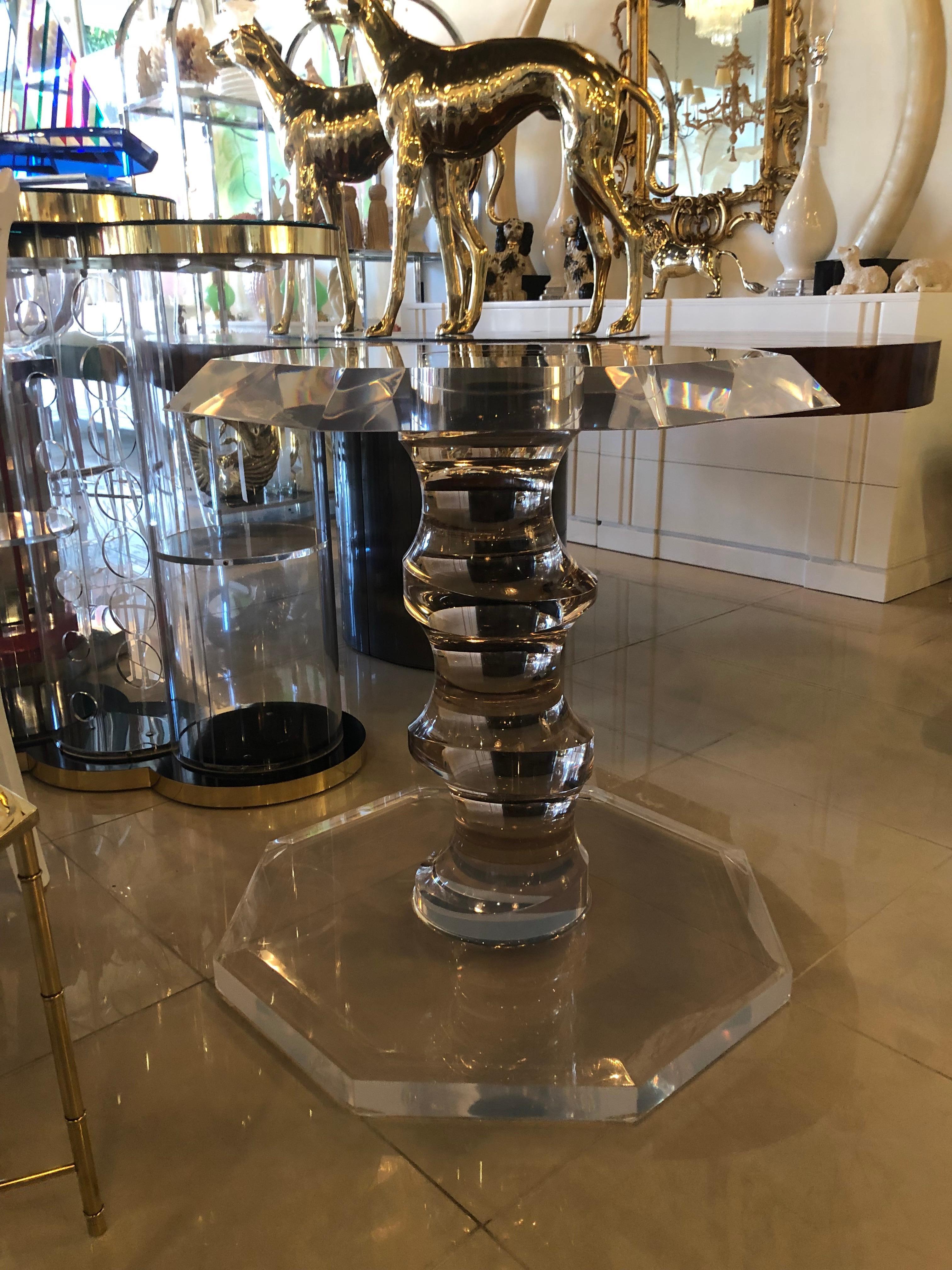 This is a one of a kind vintage Lucite base. This base can be used as a dining table, centre, entrance or game table. This can take a pretty large piece of glass or smaller if you like. The Lucite is incredibly thick on this. The centre 