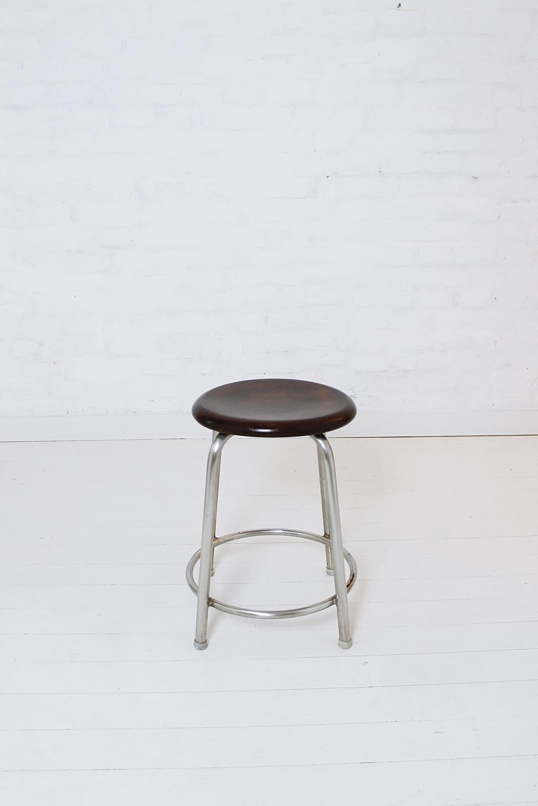 This stool was designed by Gustav Hassenpflug and manufactured by Embru in Switzerland. Hassenpflug was one of a group of pioneers. In the late 1920s he developed several designs for chairs. This model consists of a chrome-plated tubular steel