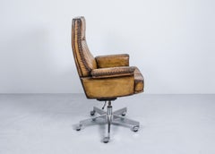 Vintage Swiss De Sede DS 35 Executive Leather Swivel Armchair on castors, 1960s