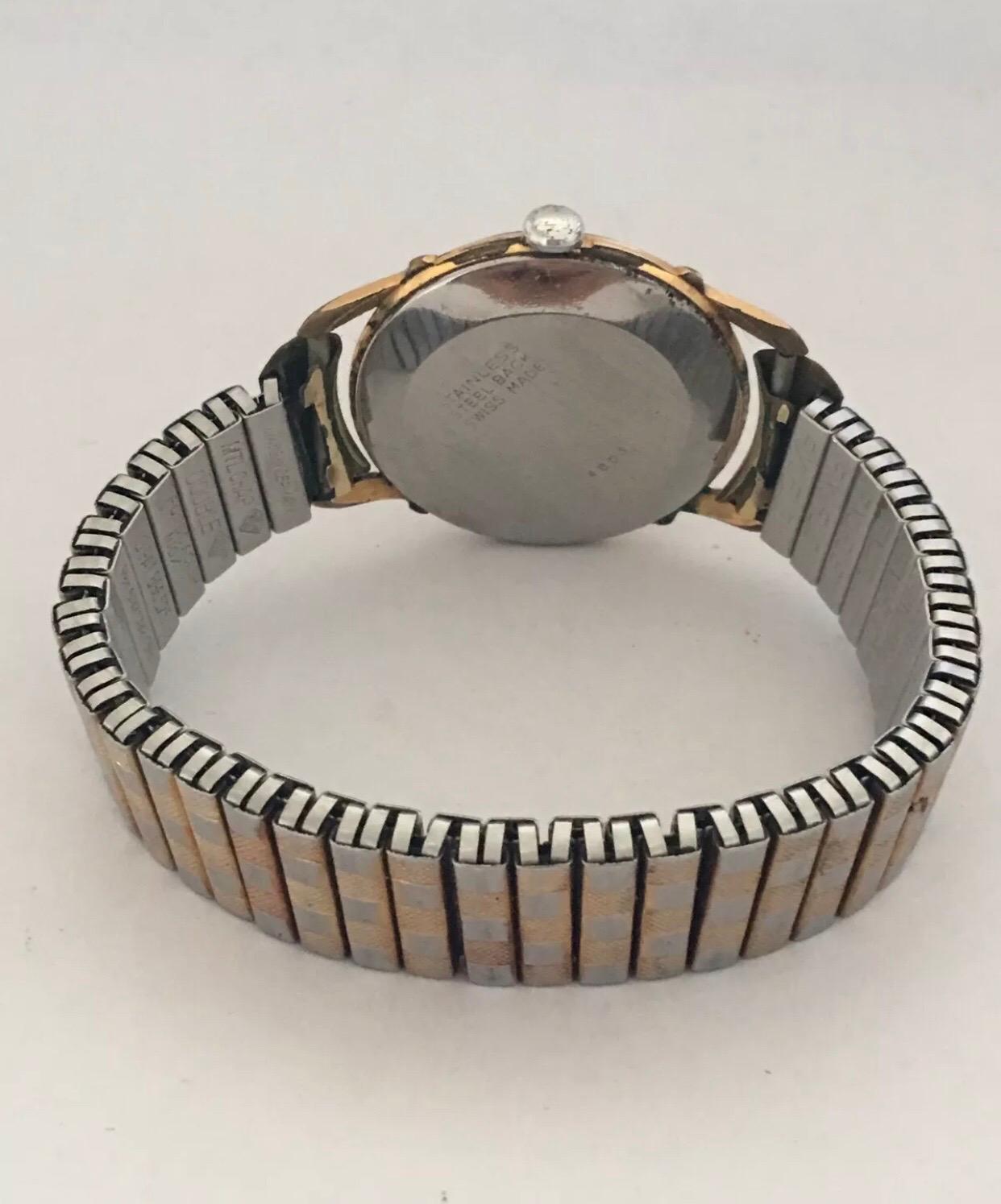 Handgeflügelte Schweizer Edelstahl-Armbanduhr mit schwarzem Zifferblatt, vergoldet im Zustand „Gut“ im Angebot in Carlisle, GB