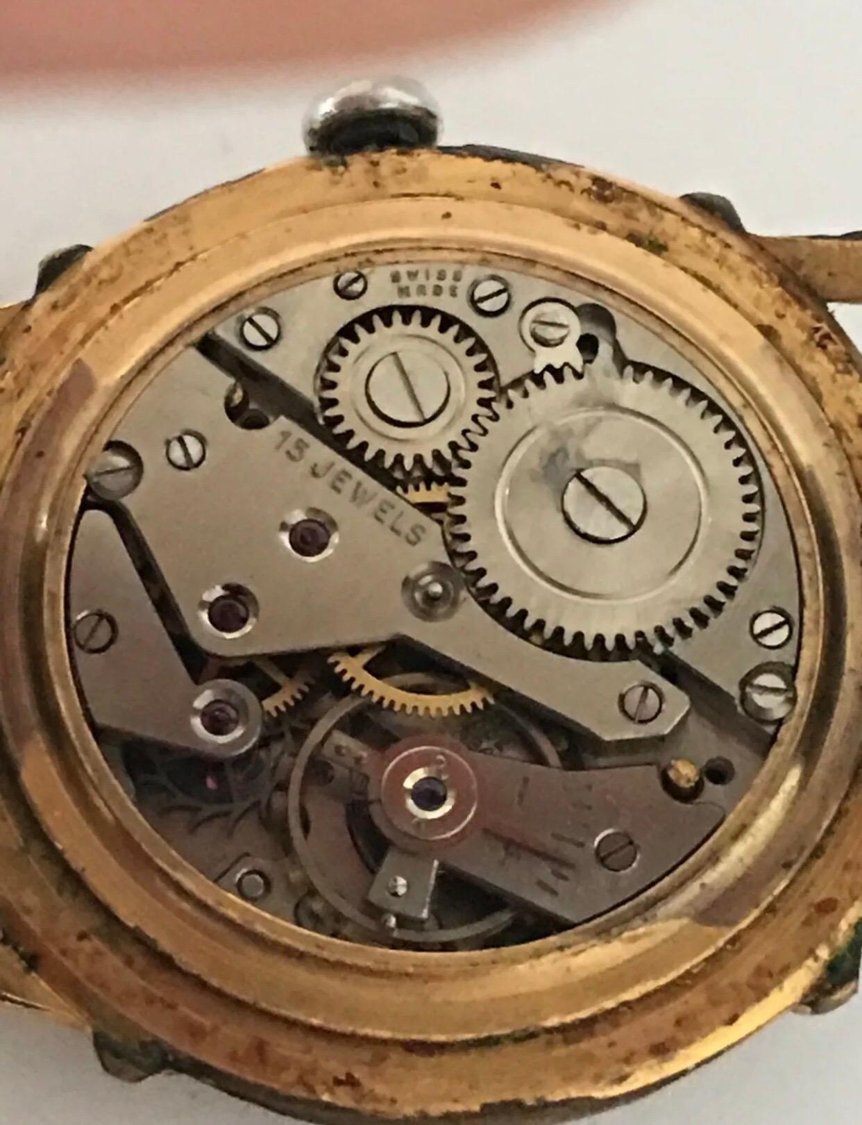 Handgeflügelte Schweizer Edelstahl-Armbanduhr mit schwarzem Zifferblatt, vergoldet im Angebot 2