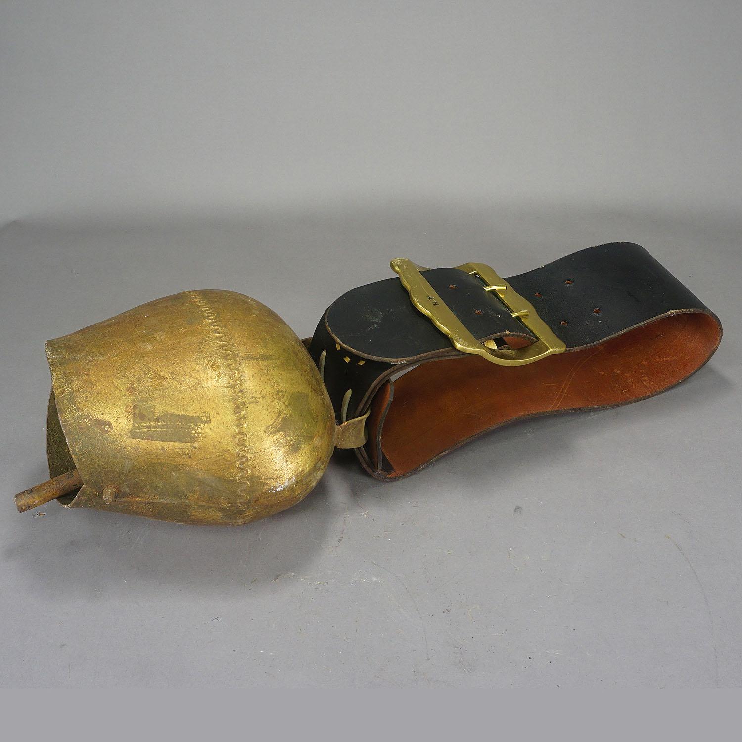 vintage cow bell with leather strap