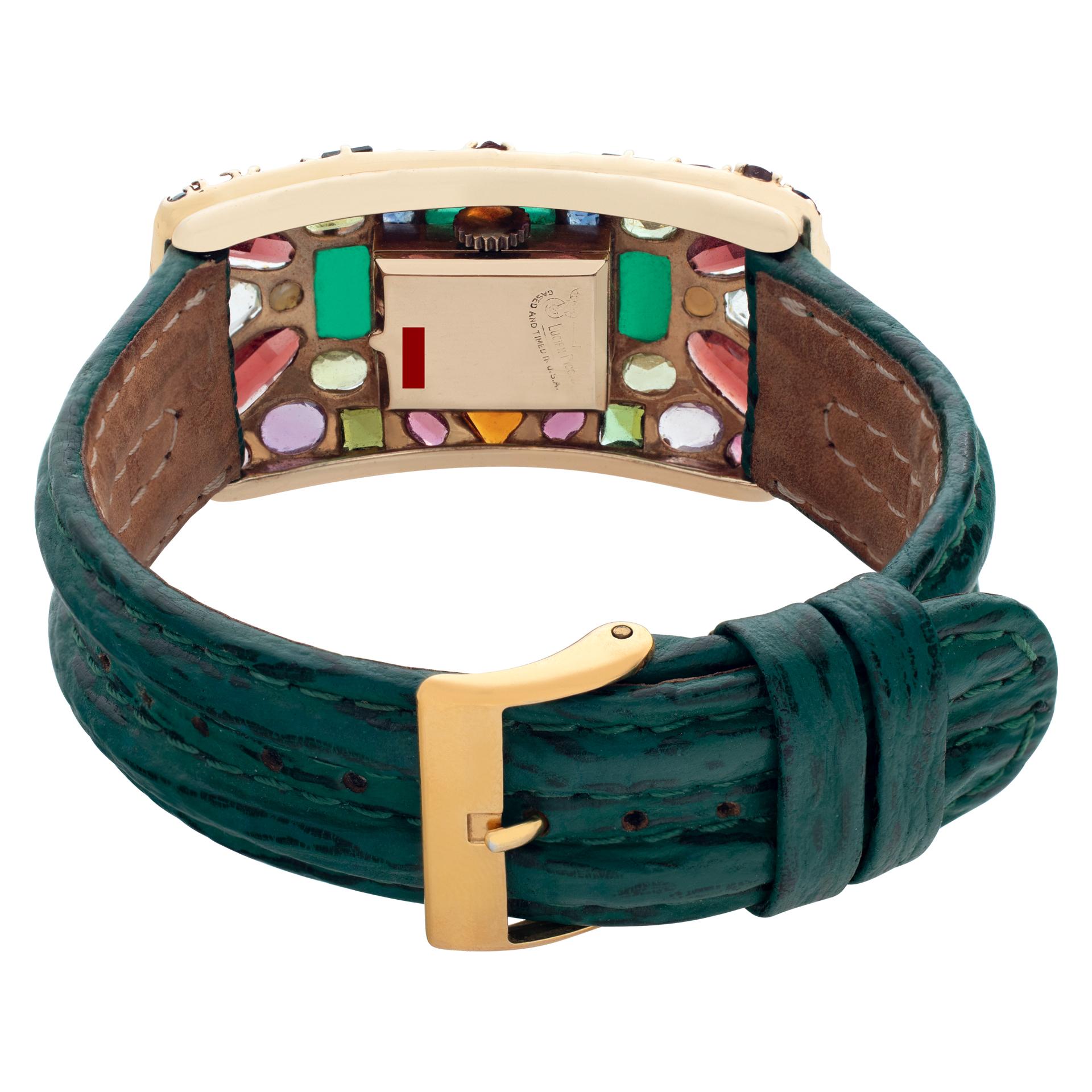 Vintage Swiss Lucien Piccard watch, with mosaic of semi precious stones: green, red garnets, cultured pearls, amethyst, tourmaline and white sapphires on green custom stitched leather strap. Manual wind movement. 26 mm case size. Circa 1960s. Fine
