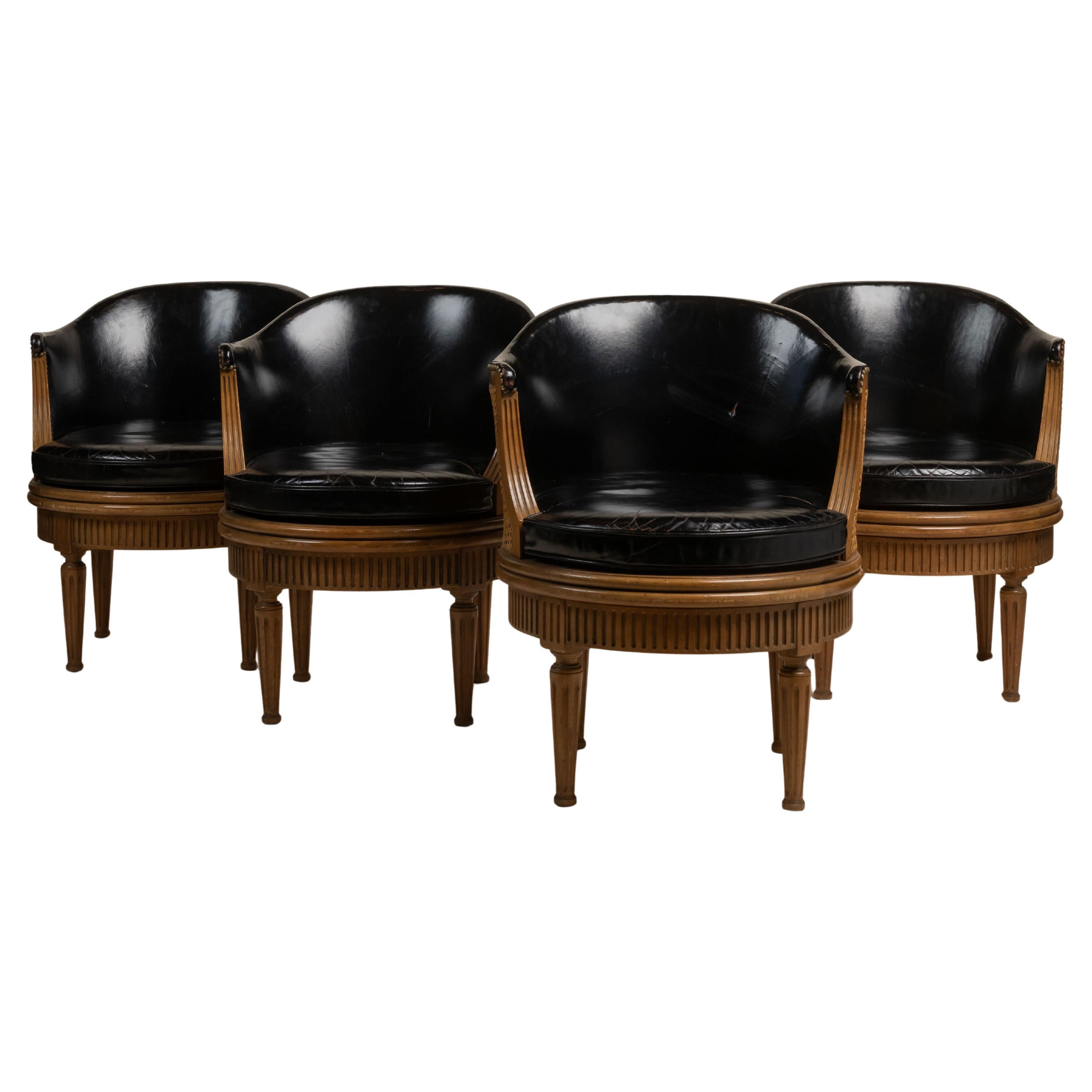 Poltrone girevoli d'epoca con canna, mogano e pelle, Baker Furniture in vendita