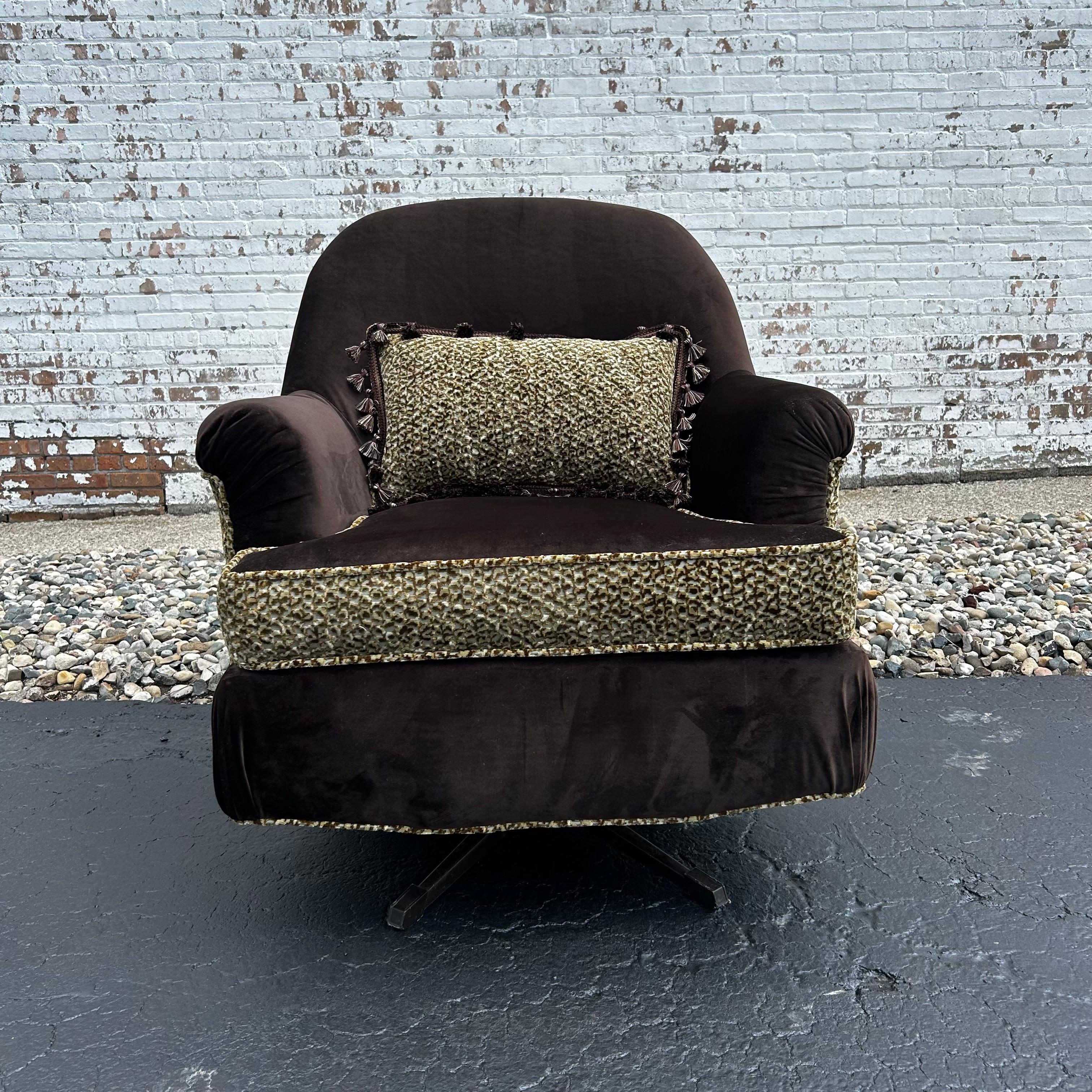 Stylish and lush, this vintage swivel rocker is looking for a new place to call home. We love her modern Safari Glam aesthetic! Ultra soft velvet in dark brown pairs with a cozy leopard print chenille in complementary colors. With fresh foam and