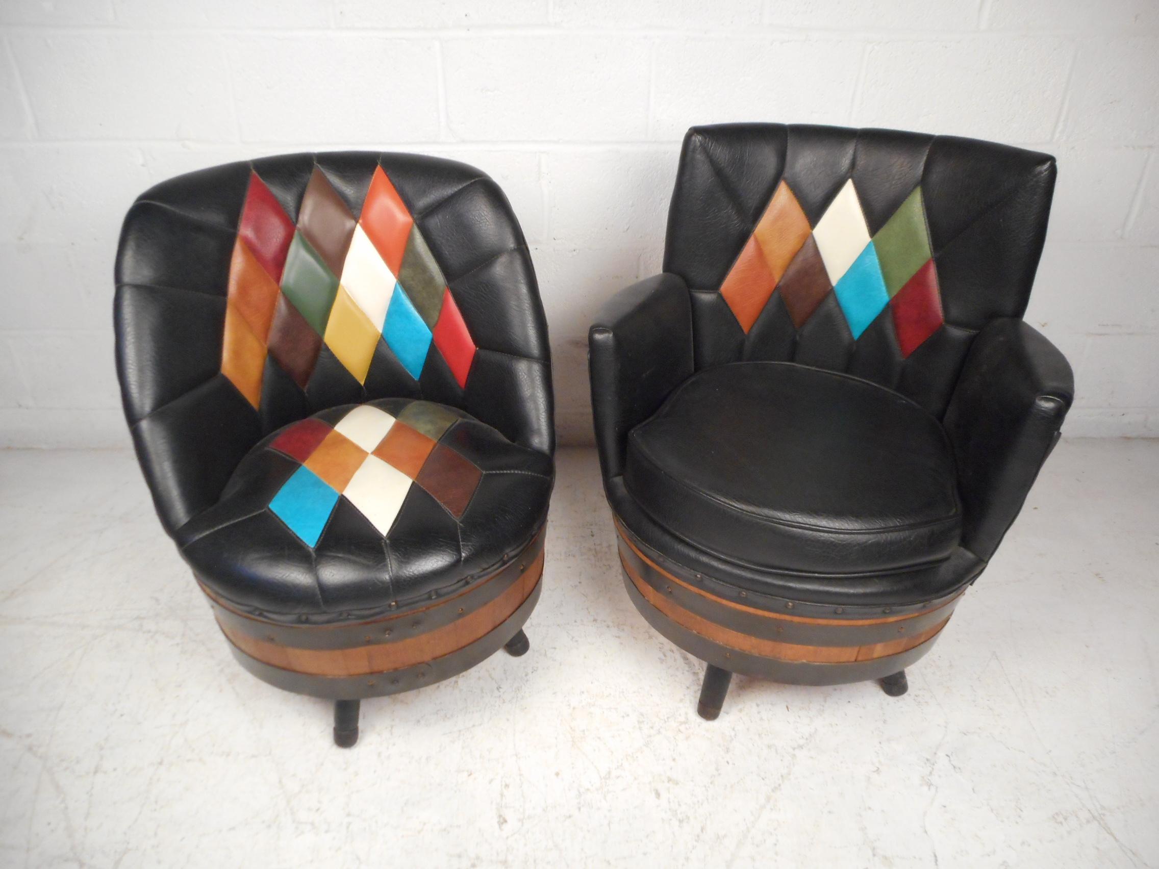 Unusual set of vintage barrel-back lounge chairs. Quite literally barrel-back chairs constructed out of whiskey/beer style barrels which serve as the frame for the chairs. The chairs have a vintage vinyl upholstery with an argyle pattern which is