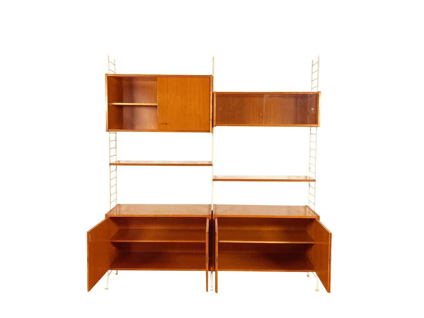 Vintage Sybille System DDR wall system produced by VEB Möbelwerk Stralsund in Germany (GDR) in the 1960s. Based on the function and design of the famous Swedish shelf system, System furniture also became popular in the GDR in the 1960s. The wall