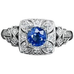 Bague solitaire Millgrain en saphir bleu et diamant