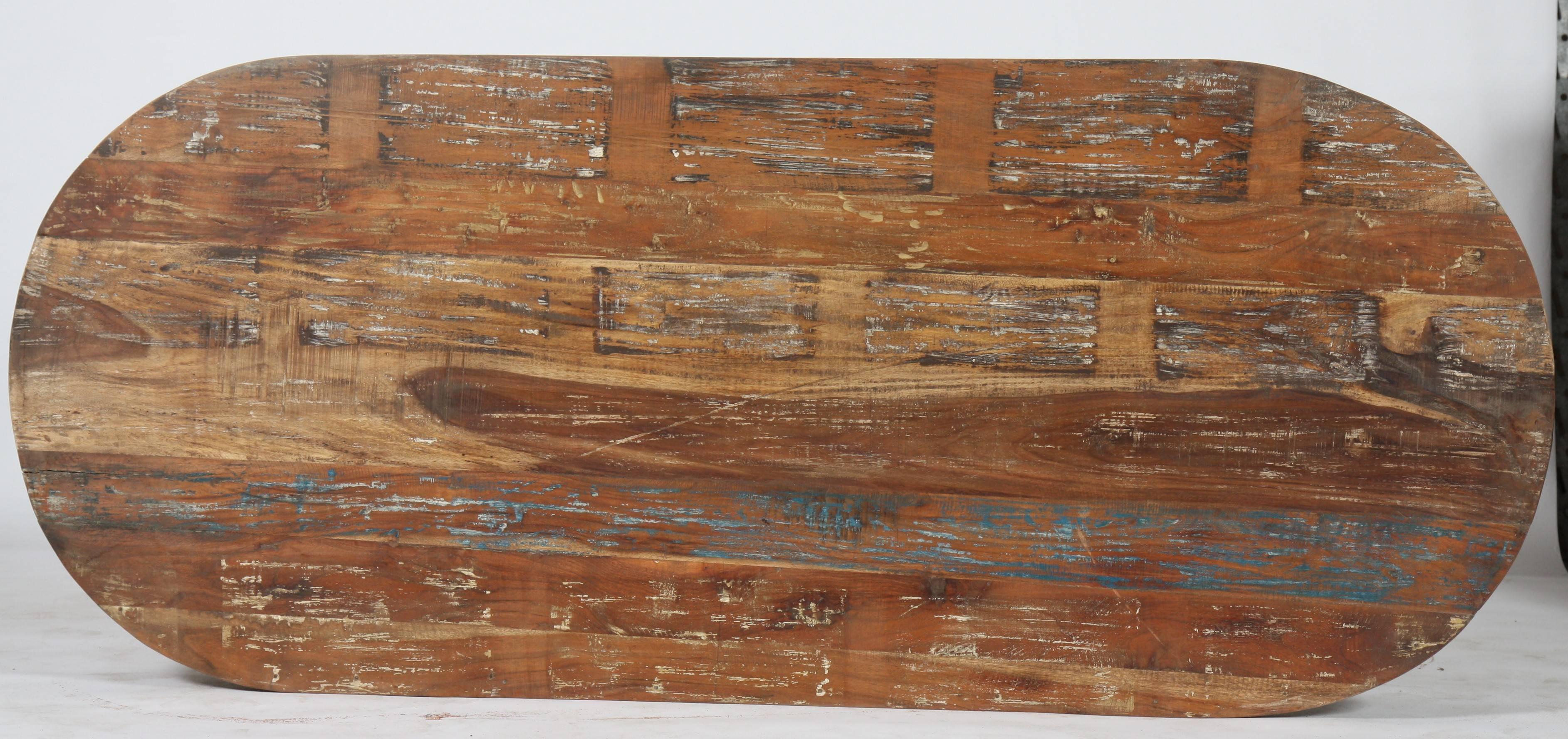 Raw exotic wood, traces of patina, patinated steel structure.