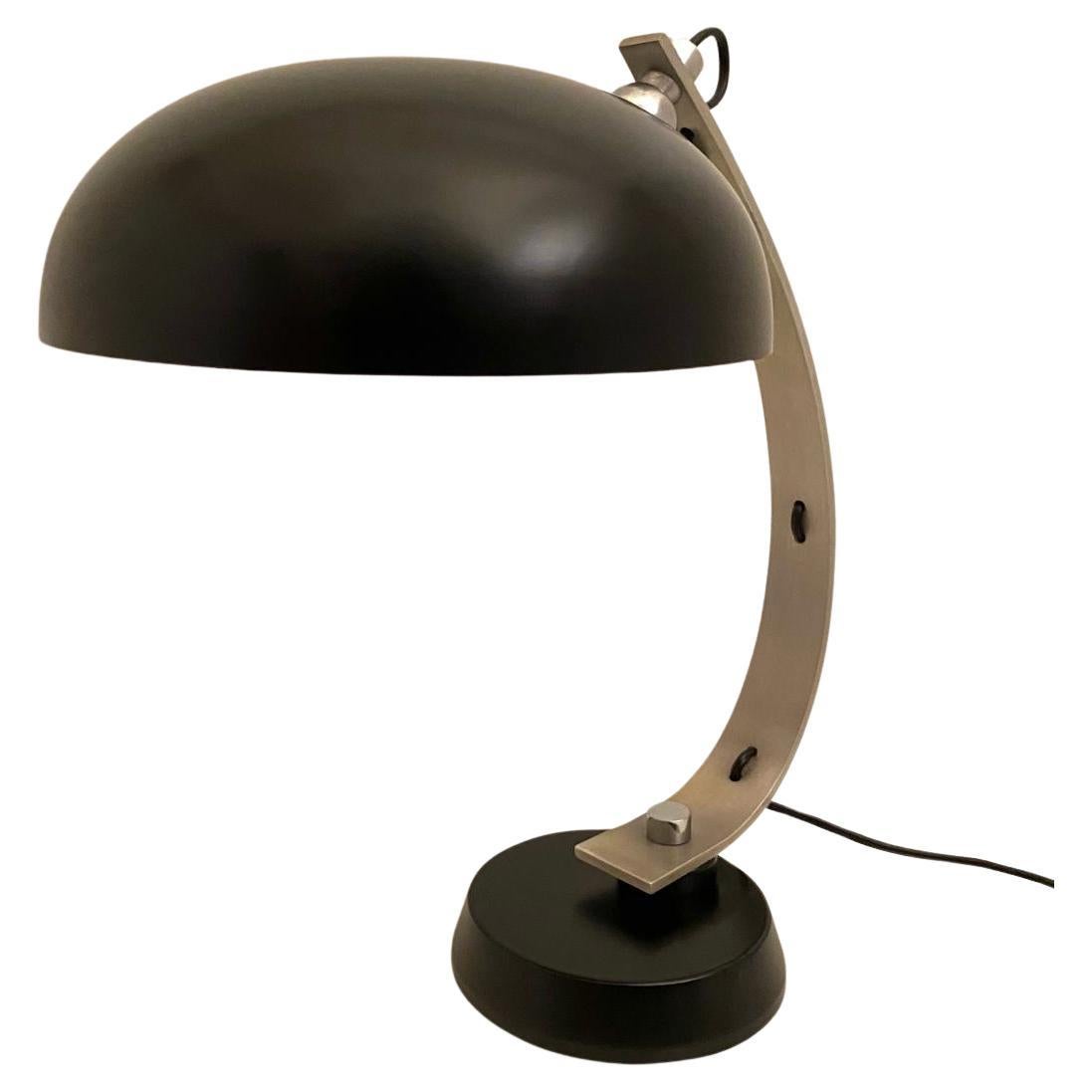 1970s vintage table lamp in industrial style. Designed by Angelo Lelli for Arredoluce in the 1970s. Double colour aluminium structure with flexible lampshade. The lamp has been recabled whilist its structure has been refined. In really good