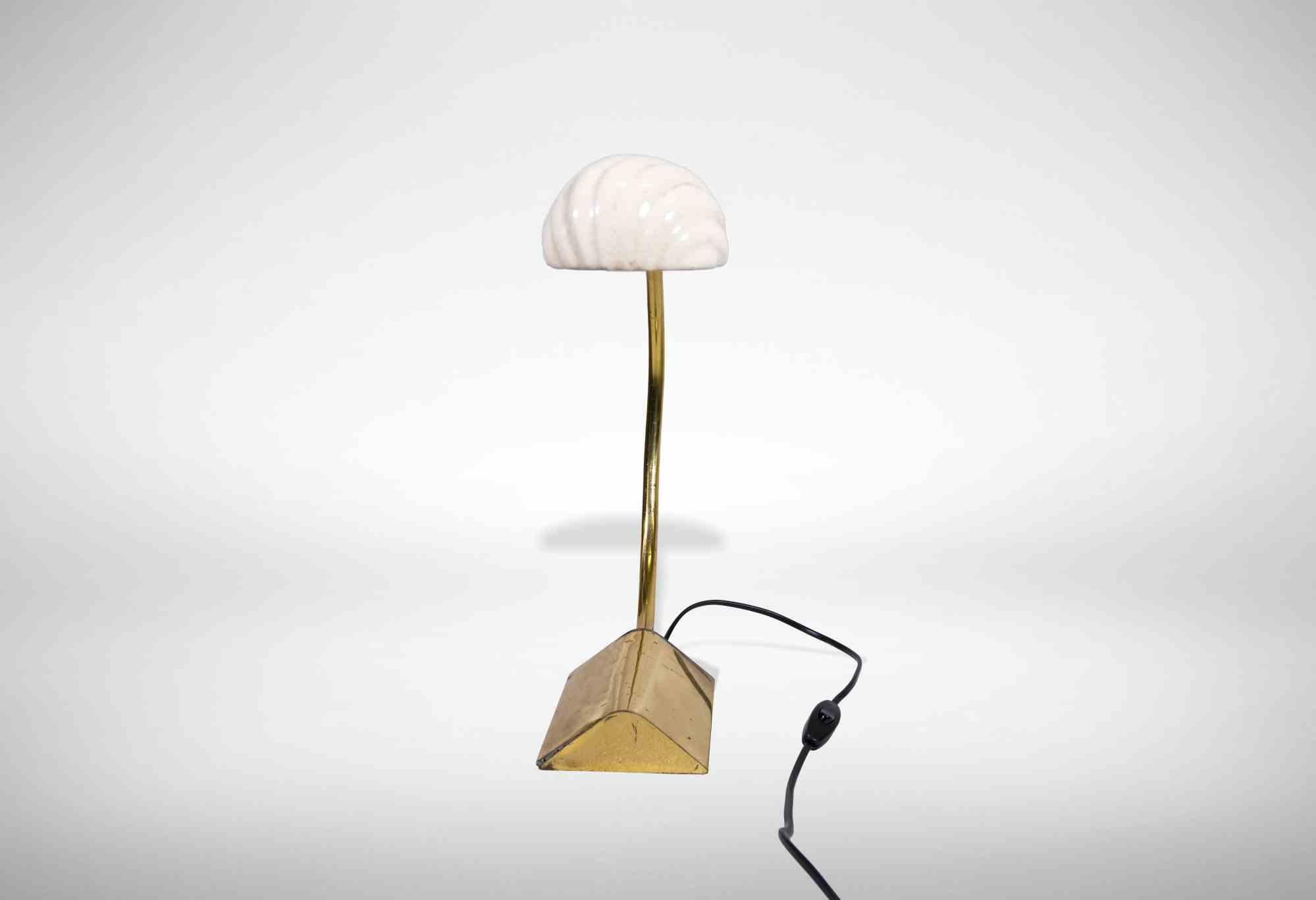 Vintage table lamp is an elegant lamp realized by the Italian designer Tommaso Barbi during the 1970s.

Created by Tommaso Barbi. Made in Italy.

Very beautiful decorative lamps with a brass body.

Tommaso Barbi is best known for his whimsical