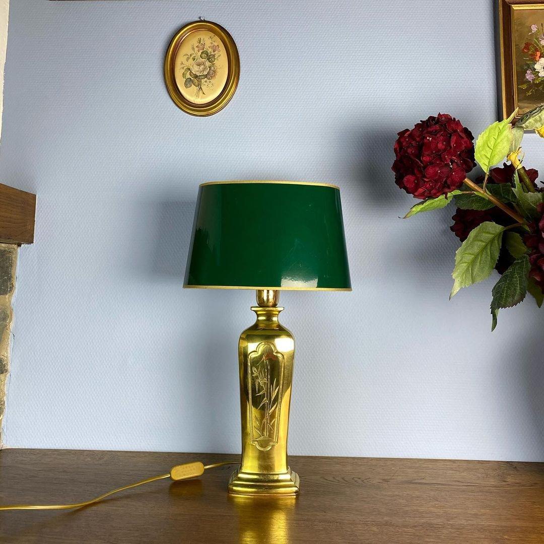 A chic Lamp in solid Brass and Shade, a refined and tasteful piece.

The natural brass base serves as an elegant platform for the lamp's dramatic scale and deeply saturated hues wich topped with elegant shade, shaped and rolled by hand.

From simple