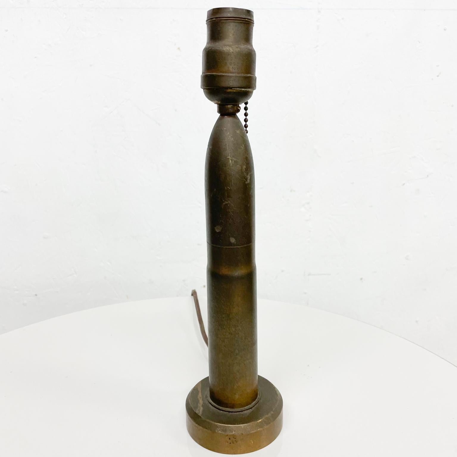 Lamp
Vintage single table lamp military artillery bullet shell, designed in patinated bronze
Patina present.
No shade.
Original vintage patina, untested, in unrestored vintage condition.
Measures: 12.63 height x 3.25 diameter at widest
See