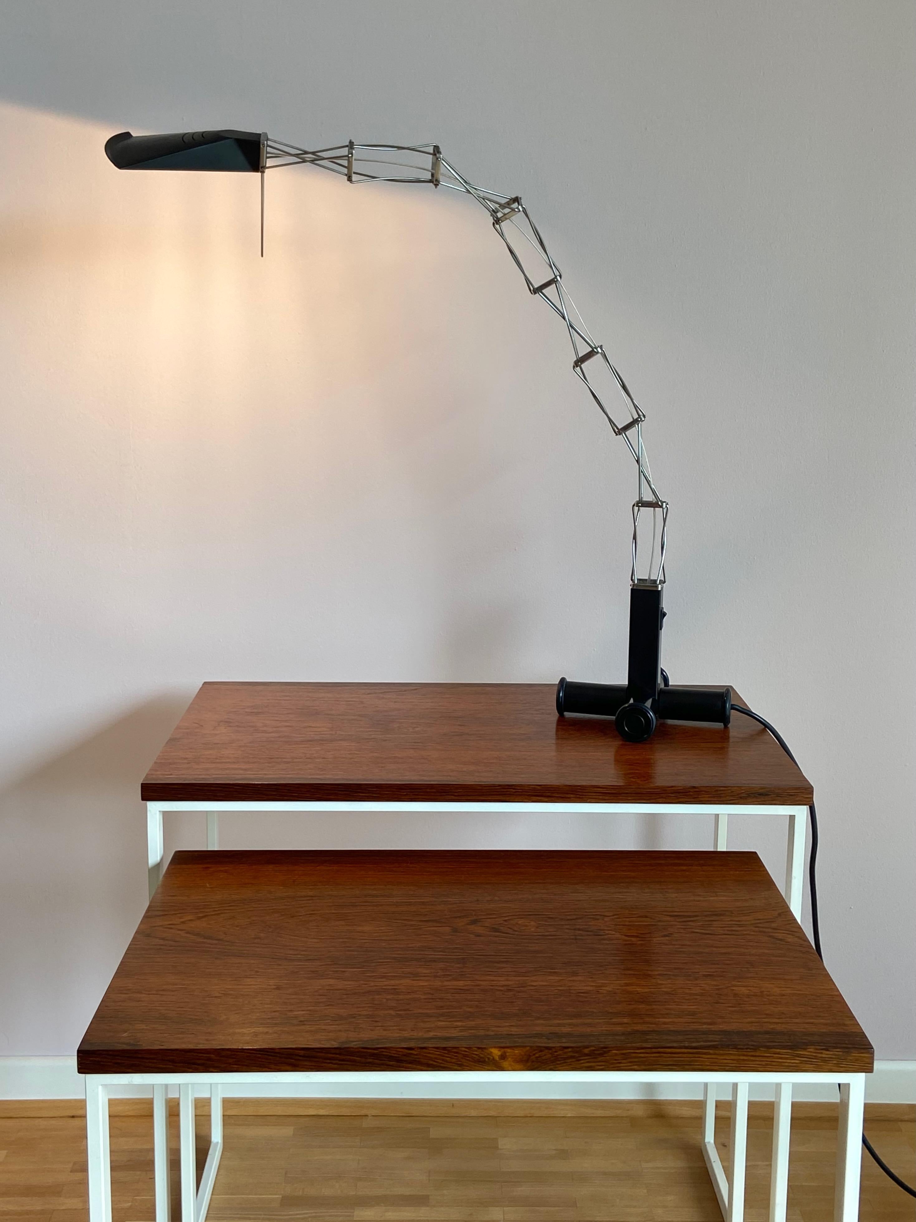 Nice vintage Multi X table lamp Design by Yaacov Kaufman for Lumina lightning Italy. Nice old version with cross base. Arm and shade adjustable. No parts missing, no damages.
Price for one Multi X light, one more available !
