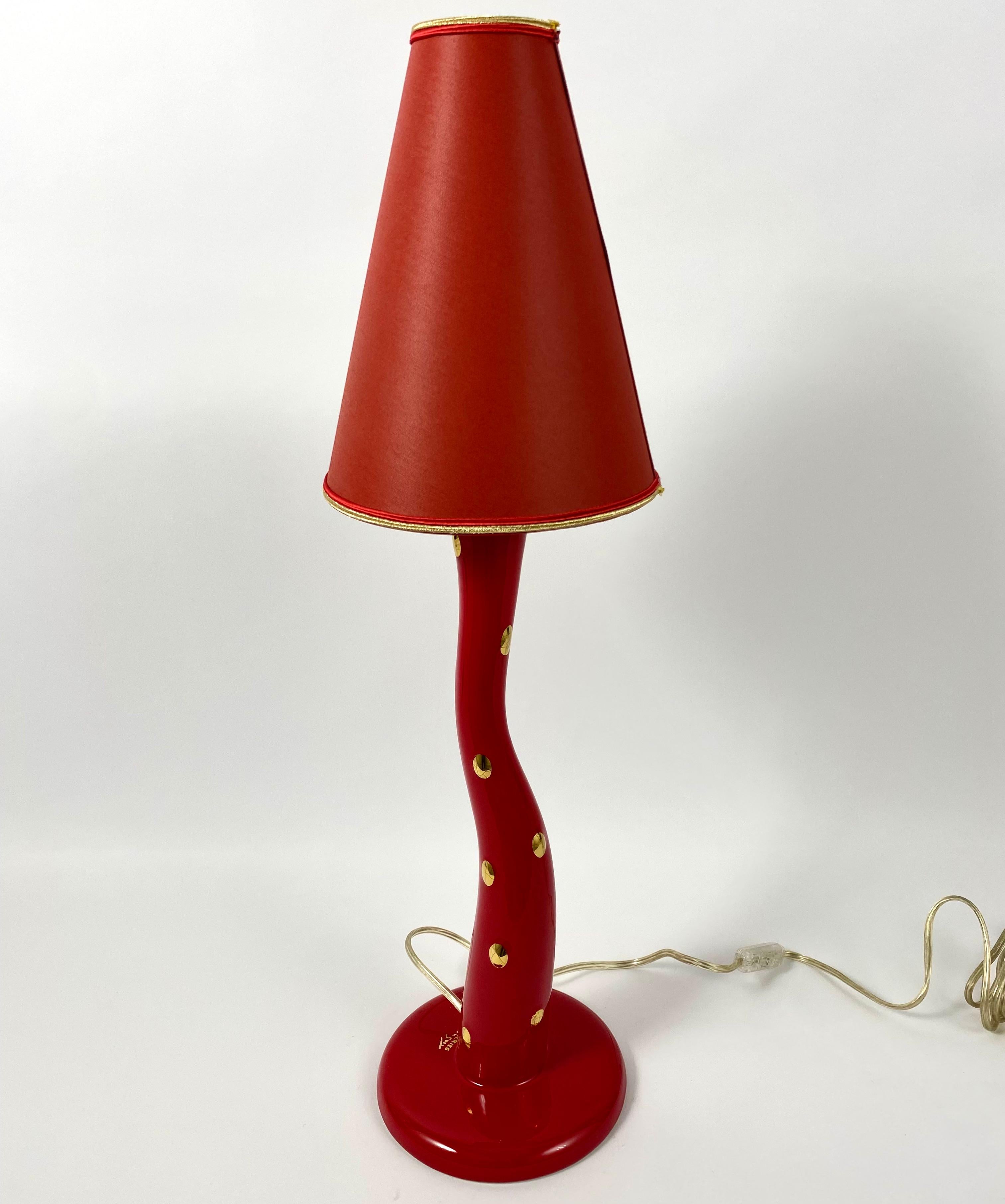 Rare table lamp signed Longwy faience factory. This lamp is made of faience and decorated with enamels.

This handcrafted piece was made in France, in the 70s.

A night light or table lamp with a lampshade is suitable for additional