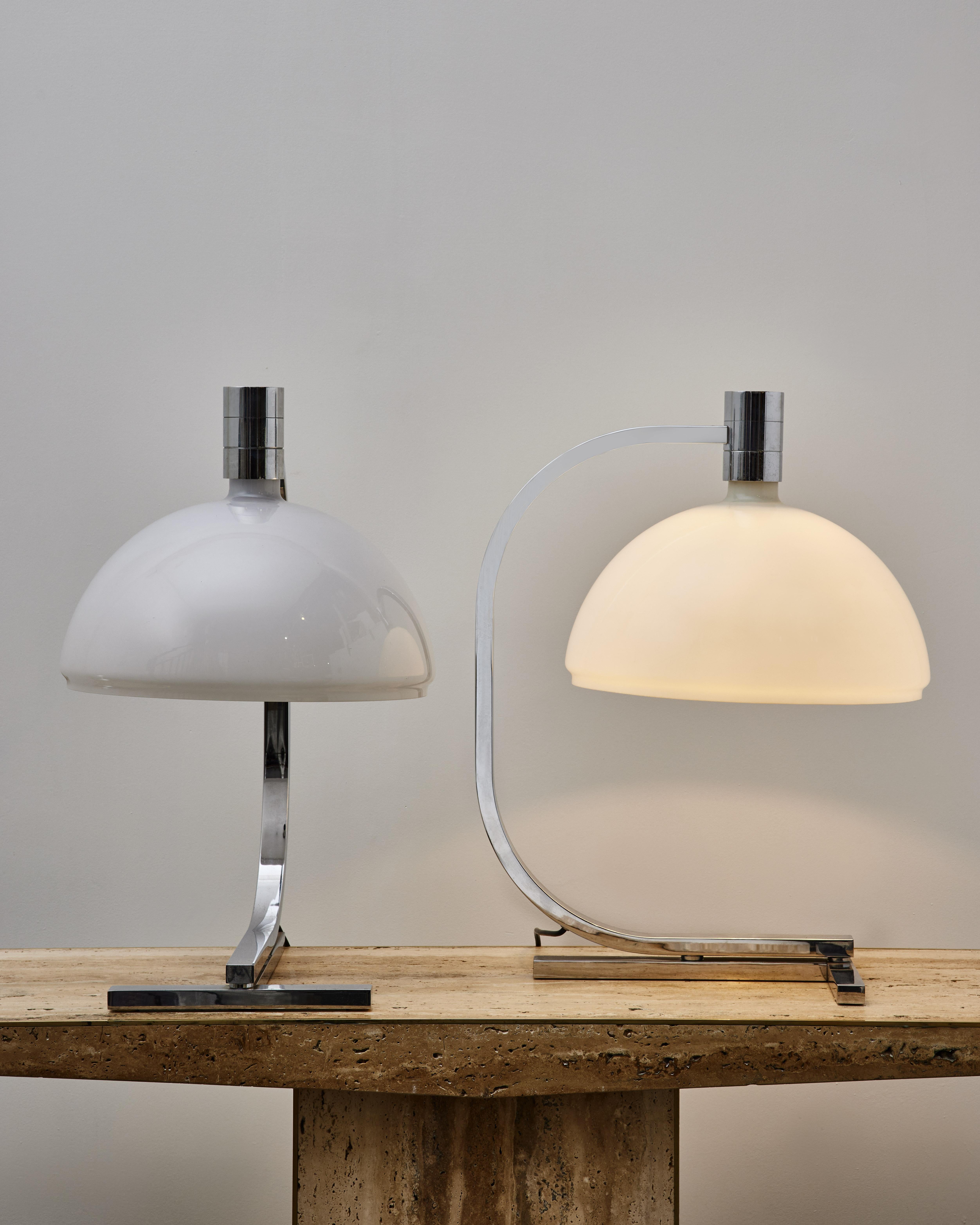 Superb vintage pair of table lamps in steel with opaline glass shades. 
France, 1960s.

