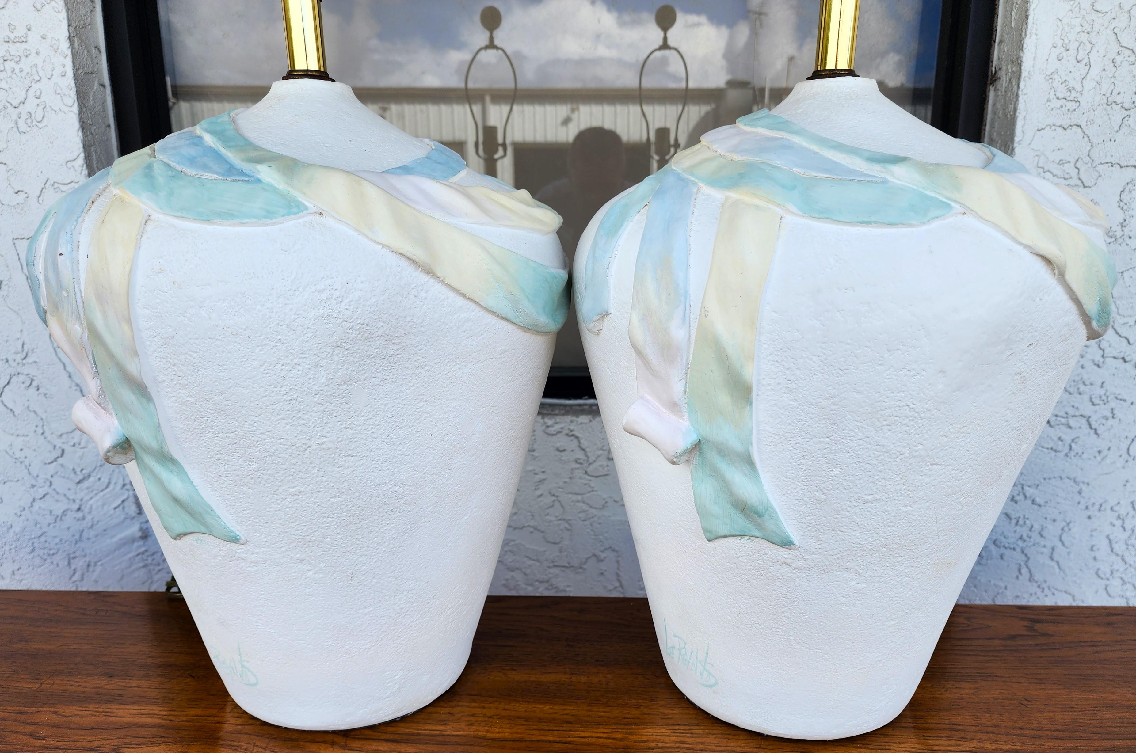 For FULL item description click on CONTINUE READING at the bottom of this page.

Offering One Of Our Recent Palm Beach Estate Fine Lighting Acquisitions Of A
Pair of 1970's Southwestern Style Table Lamps Signed LEE REYNOLDS 

We have many other