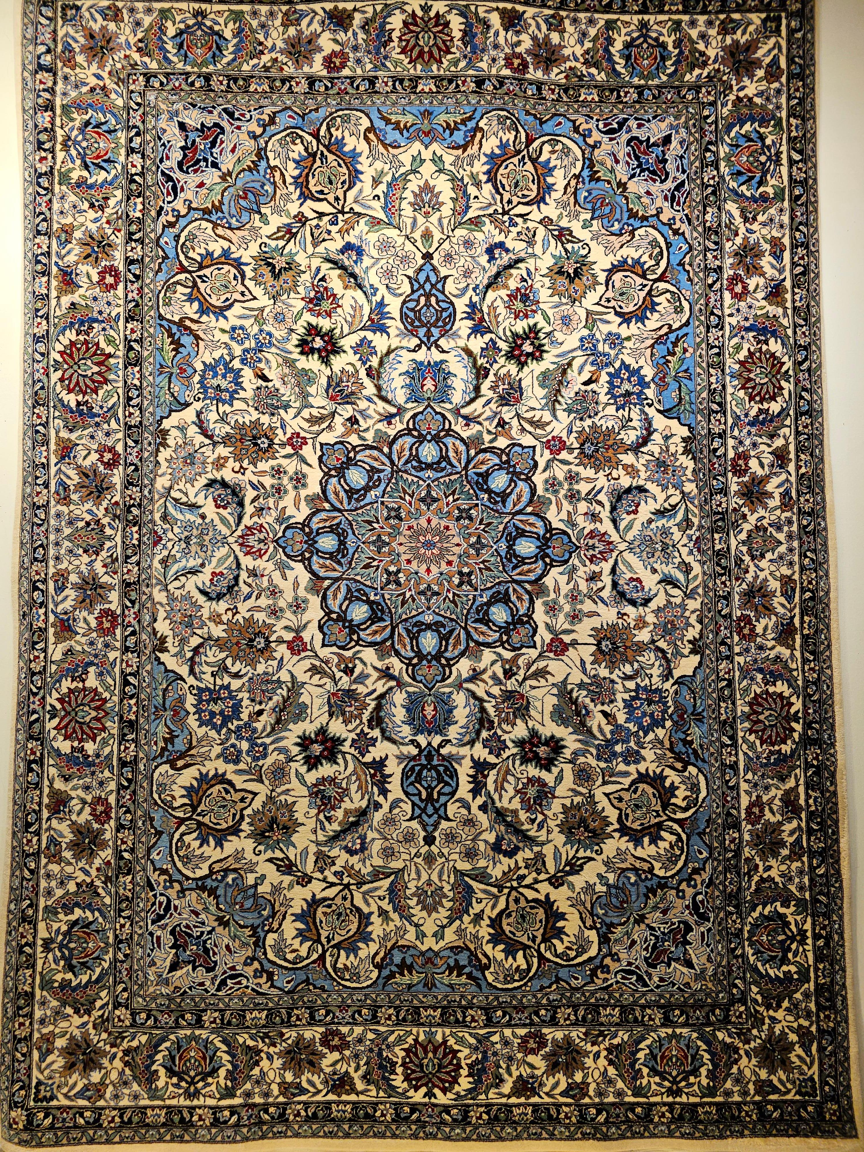 Vintage Tabriz Rug in Floral Design With French Blue, Green, and Ivory Colors.   The design of the rug is similar to the classic Persian Tabriz rugs that were woven in the 16th and 17th centuries. The use of the fine wool and wonderful colors makes