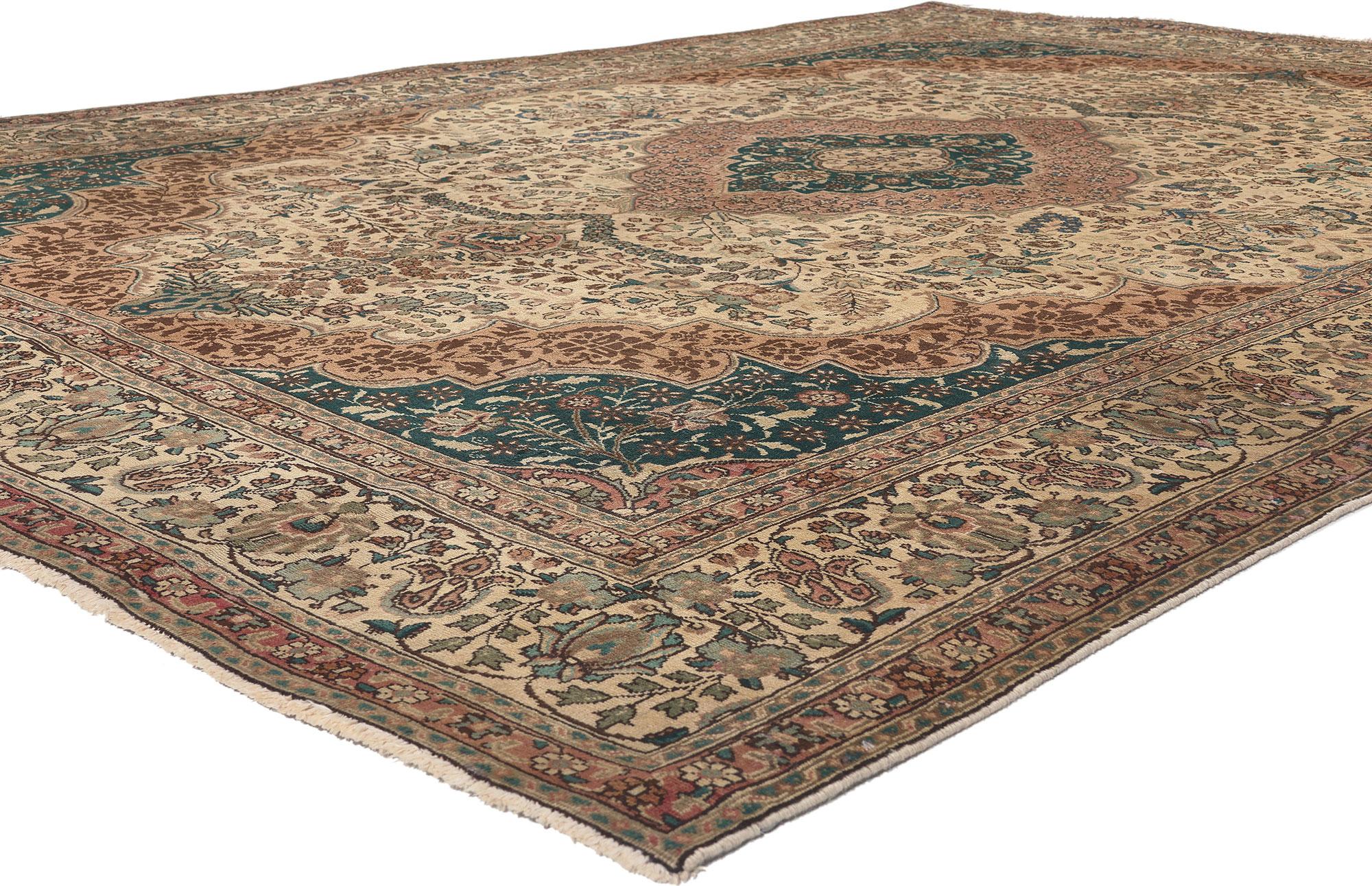76476 Vintage Persian Tabriz Rug, 08’00 x 11’00. 
Warm opulence meets traditional sensibility in this vintage Persian Tabriz rug. The meticulous botanical details and earth-tone colors woven into this piece work together creating an elegant,