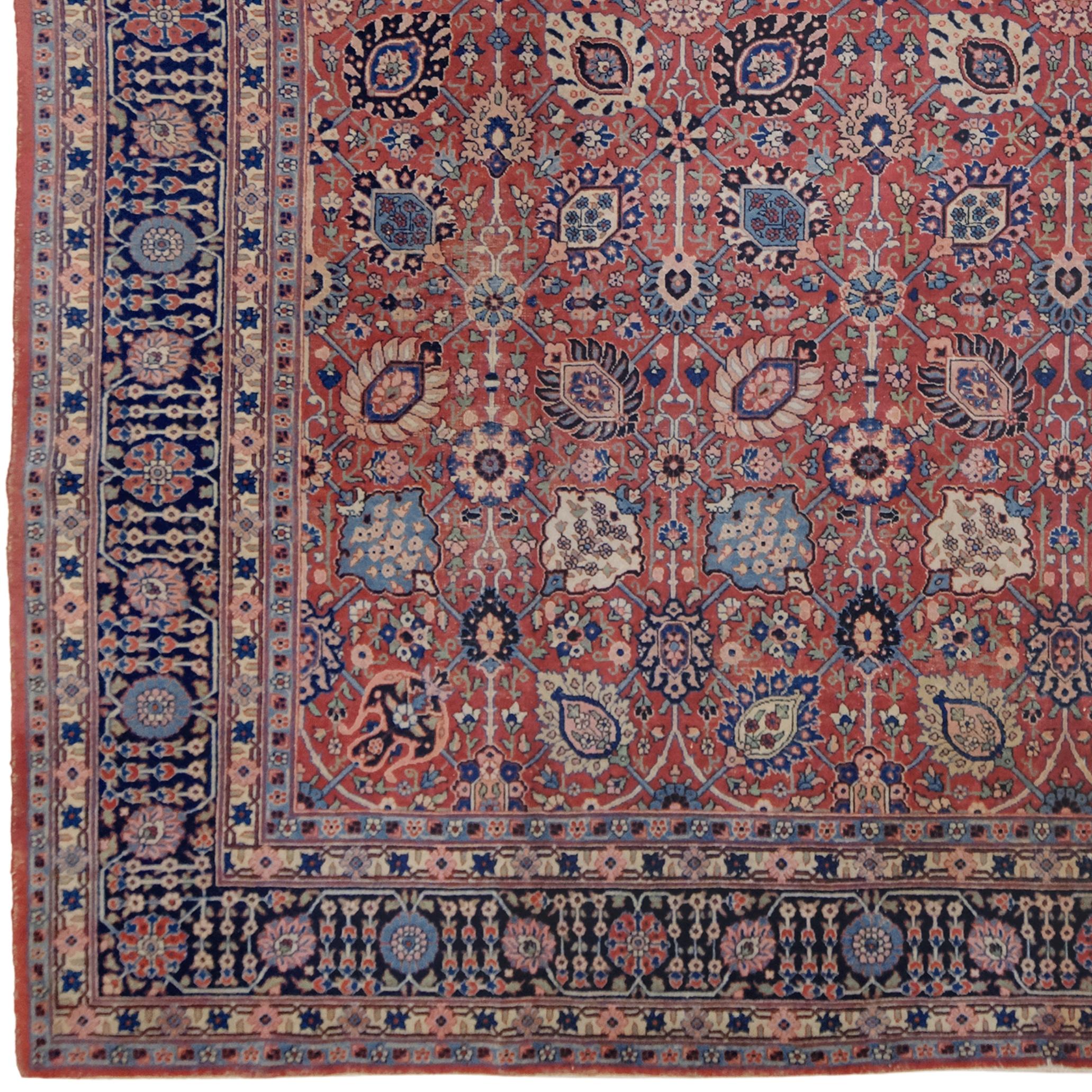 This magnificent Tabriz carpet was woven in the early 20th century in Tabriz, one of Iran's most renowned carpet-making centers. Reflecting the region's rich cultural heritage, this carpet is a rare work that has preserved its artistic and aesthetic