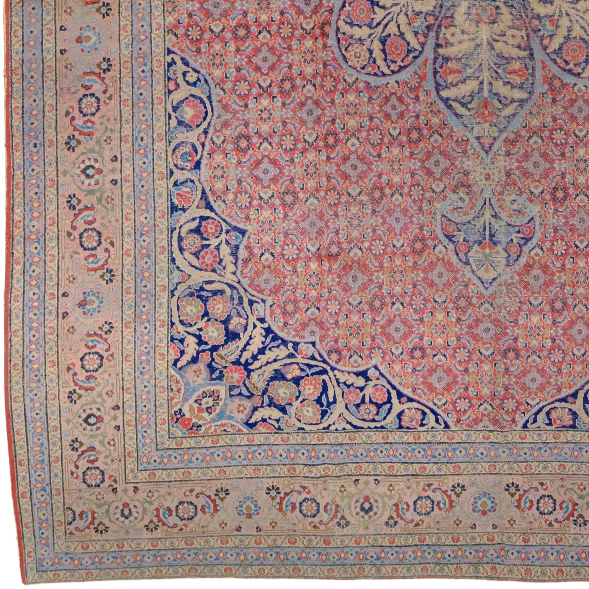 This magnificent Tabriz carpet was woven in Iran, one of the Middle East's most renowned carpet-making centers, in the early 20th century. With its eye-catching colors, elegant patterns, and impeccable craftsmanship, this carpet is a work of art