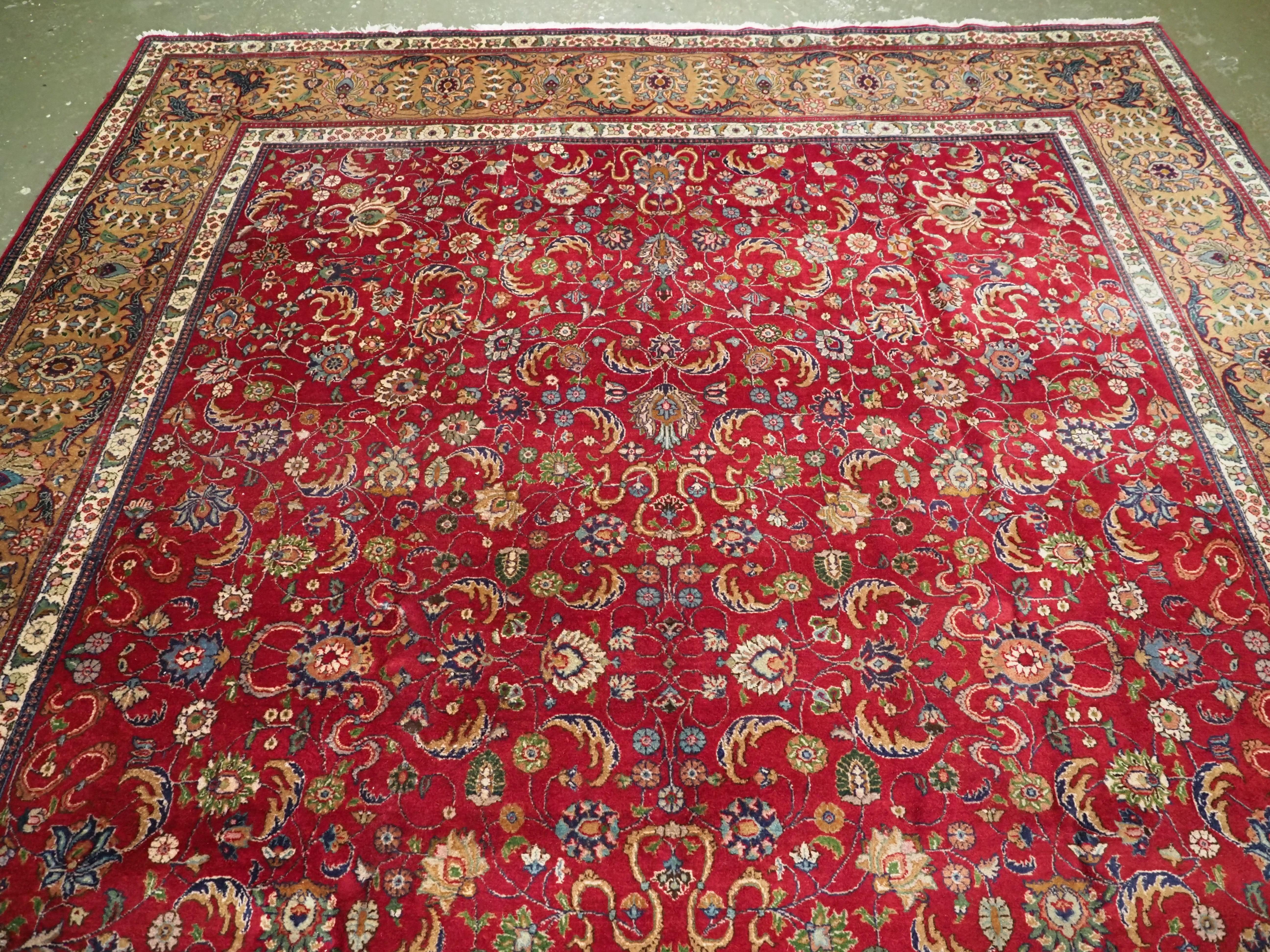 Asian Vintage Tabriz carpet of traditional all over design in large room size. For Sale
