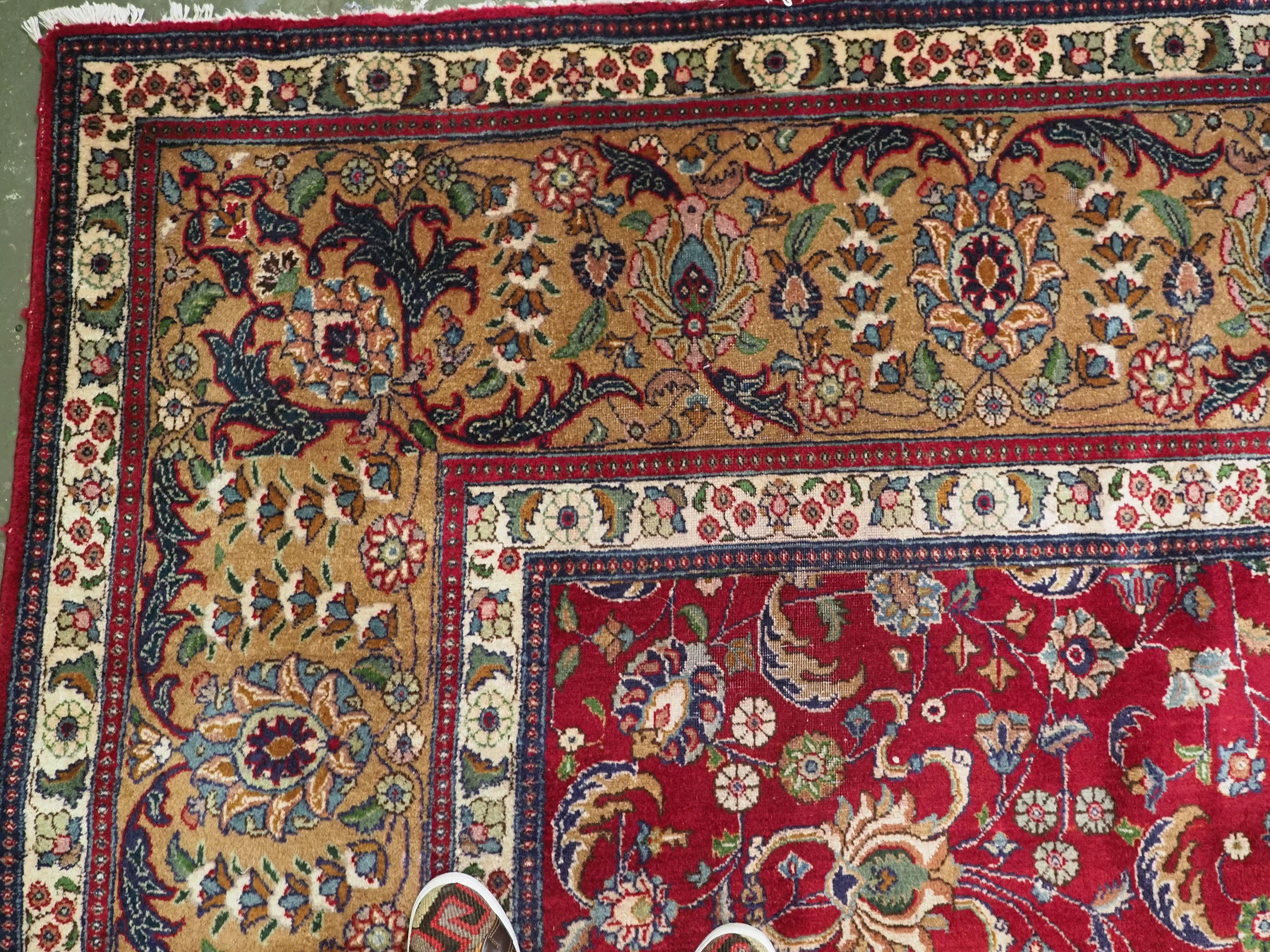Wool Vintage Tabriz carpet of traditional all over design in large room size. For Sale