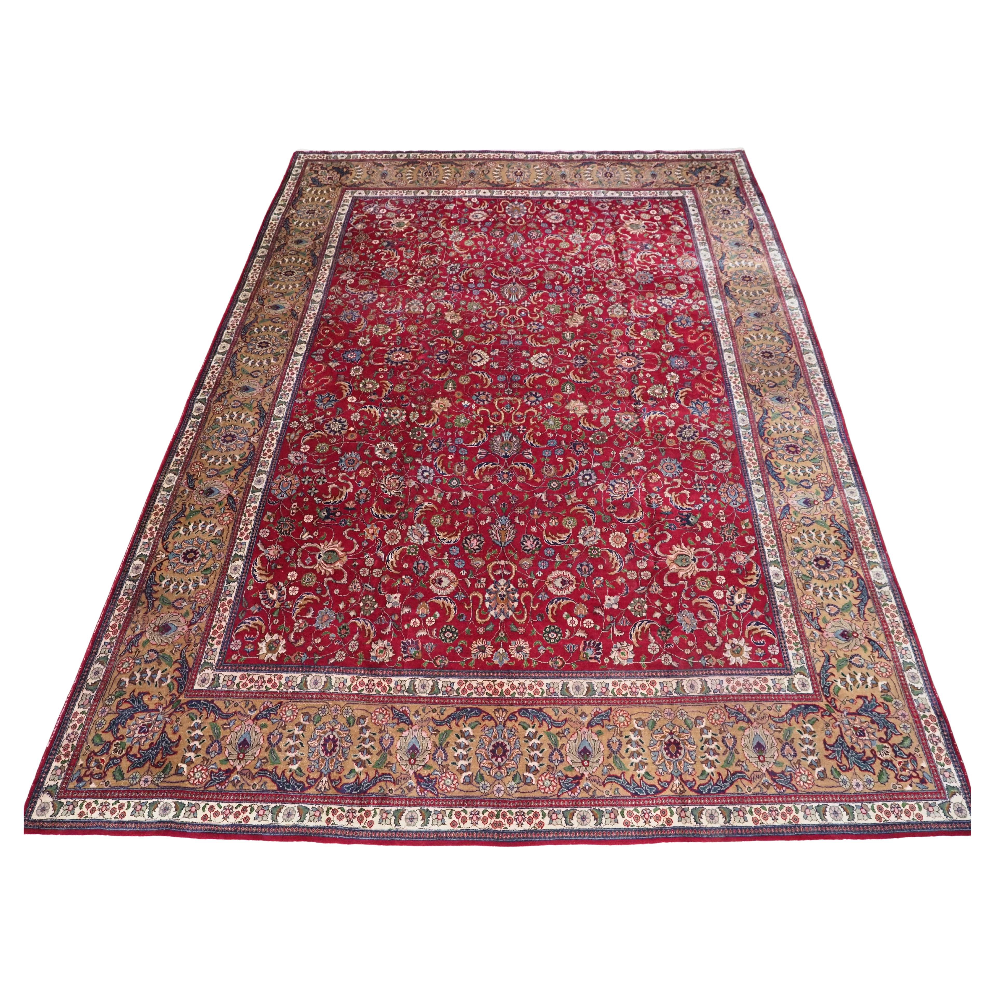 Vintage Tabriz carpet of traditional all over design in large room size.