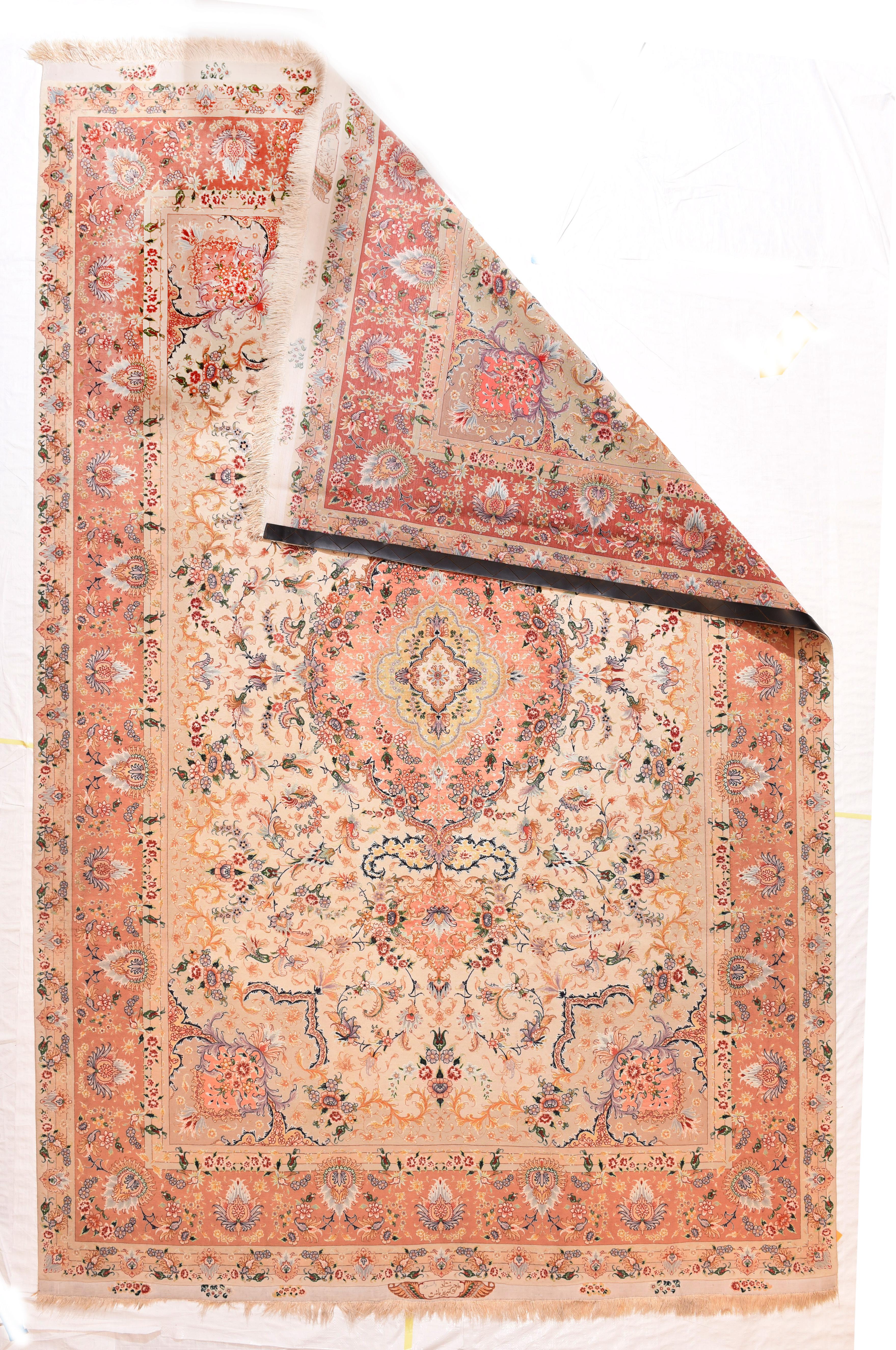 Vintage Tabriz Rug 6'7'' x 10'2''. Elaboration knows no bounds on this very finely woven, NW Persian urban carpet with an eggshell Sub-field hosting myriads of racemes, vinery segments, palmettes and botehs. The artistically nested oval medallion
