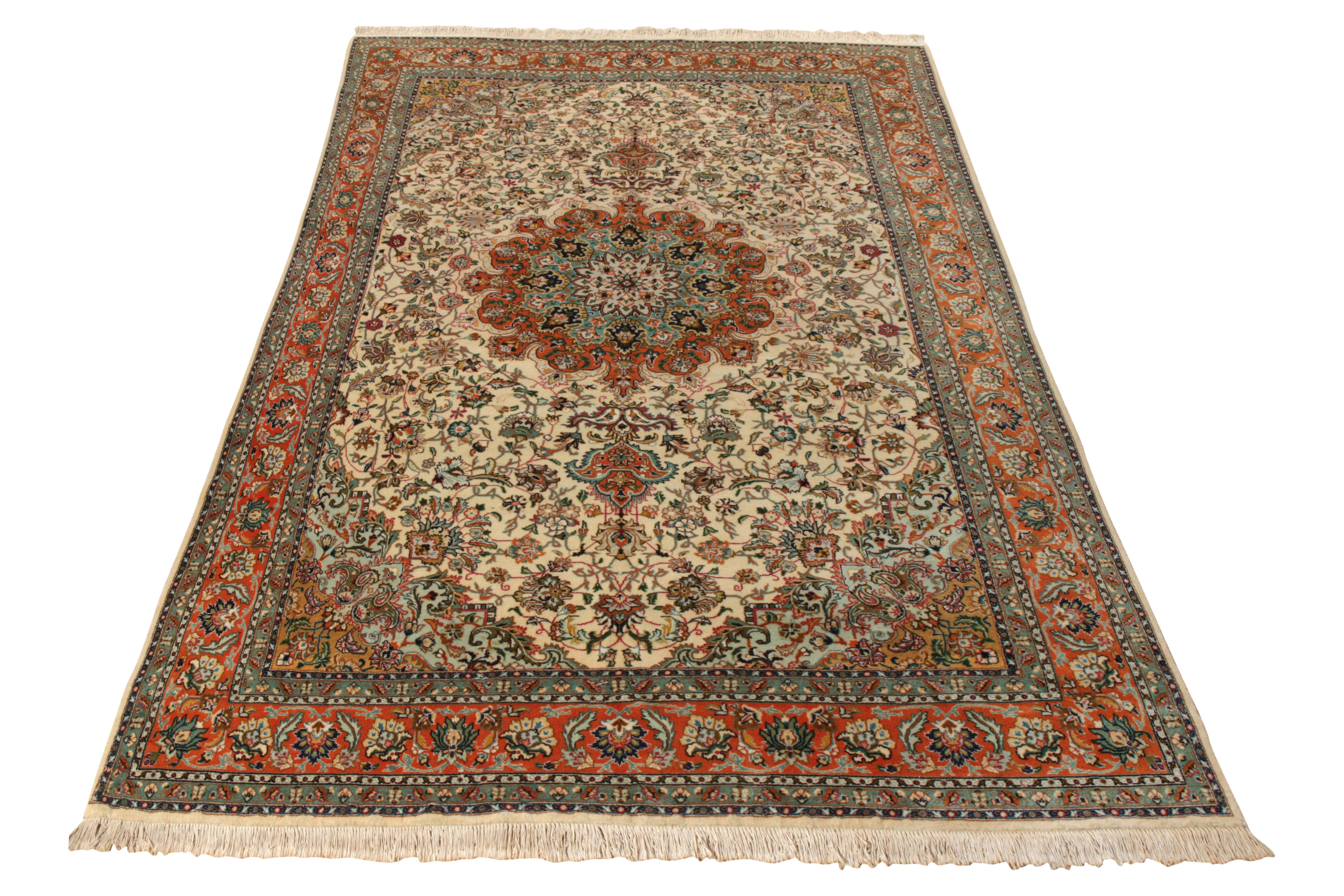 Hand-knotted in wool, this mid-century Tabriz rug joins Rug & Kilim’s Antique & Vintage collection. Exhibiting an impeccable show of craftsmanship, this 6x10 vision enjoys an extravagant vision with an alluring medallion pattern unfurling into an