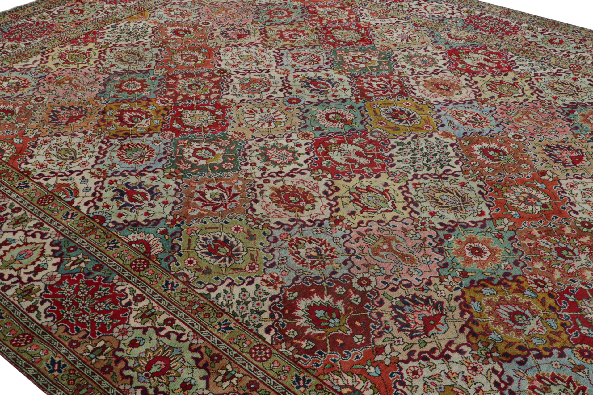 Hand-Knotted Vintage Tabriz rug in Polychromatic Floral Patterns by Rug & Kilim For Sale