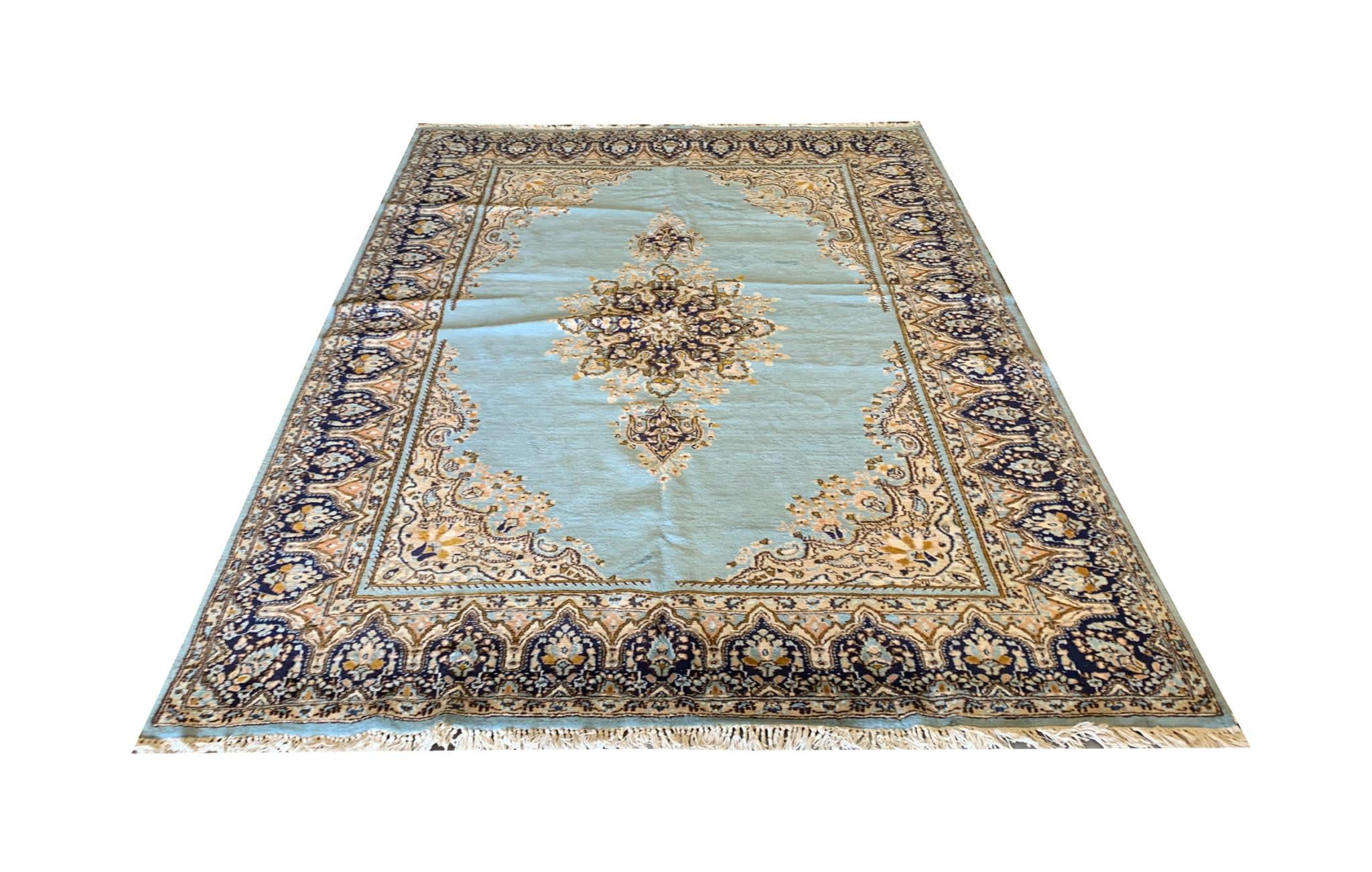 Introducing our exquisite vintage large rug, a true masterpiece that adds a touch of timeless elegance to any space. Hand-knotted with the utmost care and precision, this rug boasts unparalleled craftsmanship that speaks volumes of its heritage.