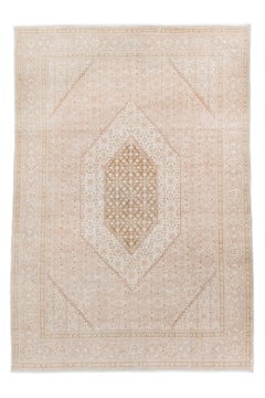 Vintage Tabriz Rug with Soft Blush Field and Ivory Floral Medallion