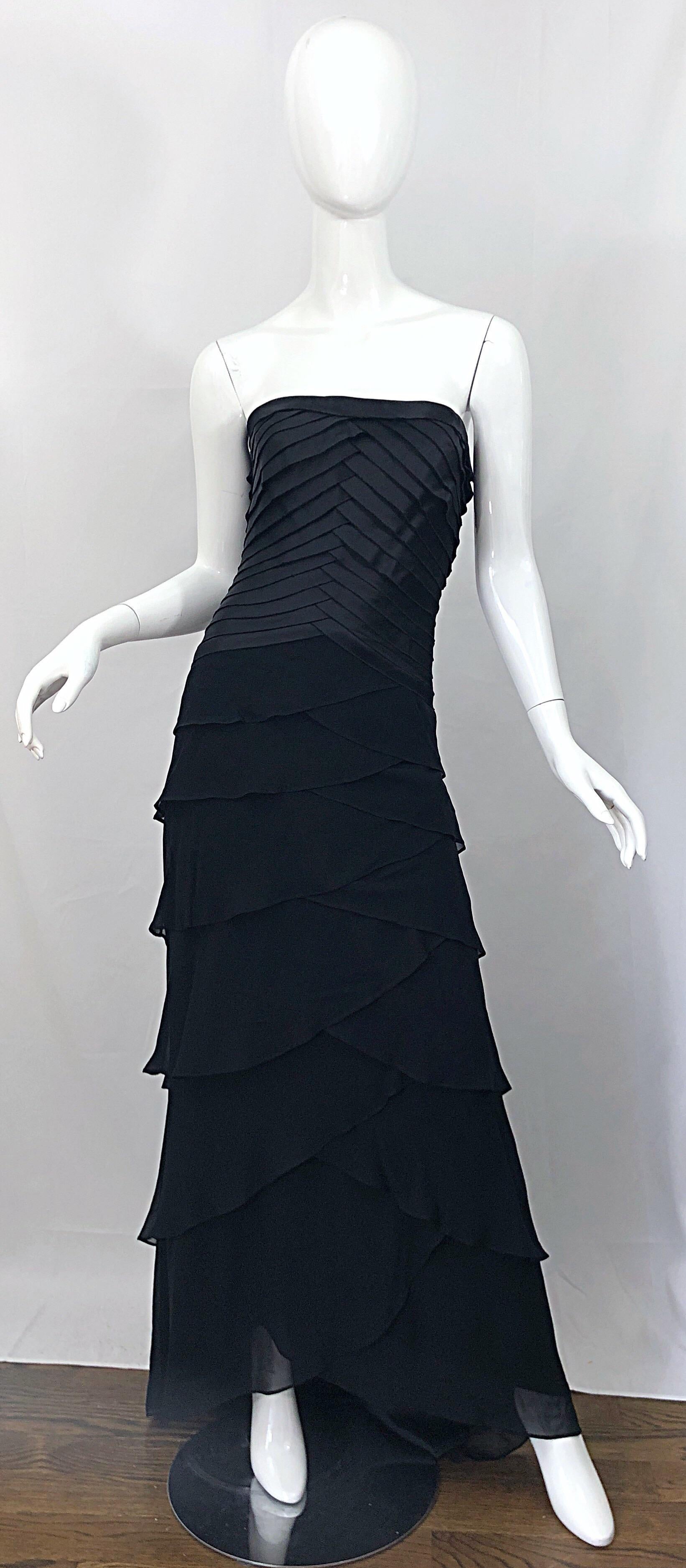 Beautiful vintage late 90s TADASHI SHOJI black silk and chiffon Size 14 / 16 strapless evening gown! Flattering silk paneled bodice with tiers of black chiffon on the skirt. Hidden zipper up the back with hook-and-eye closure. The perfect classic