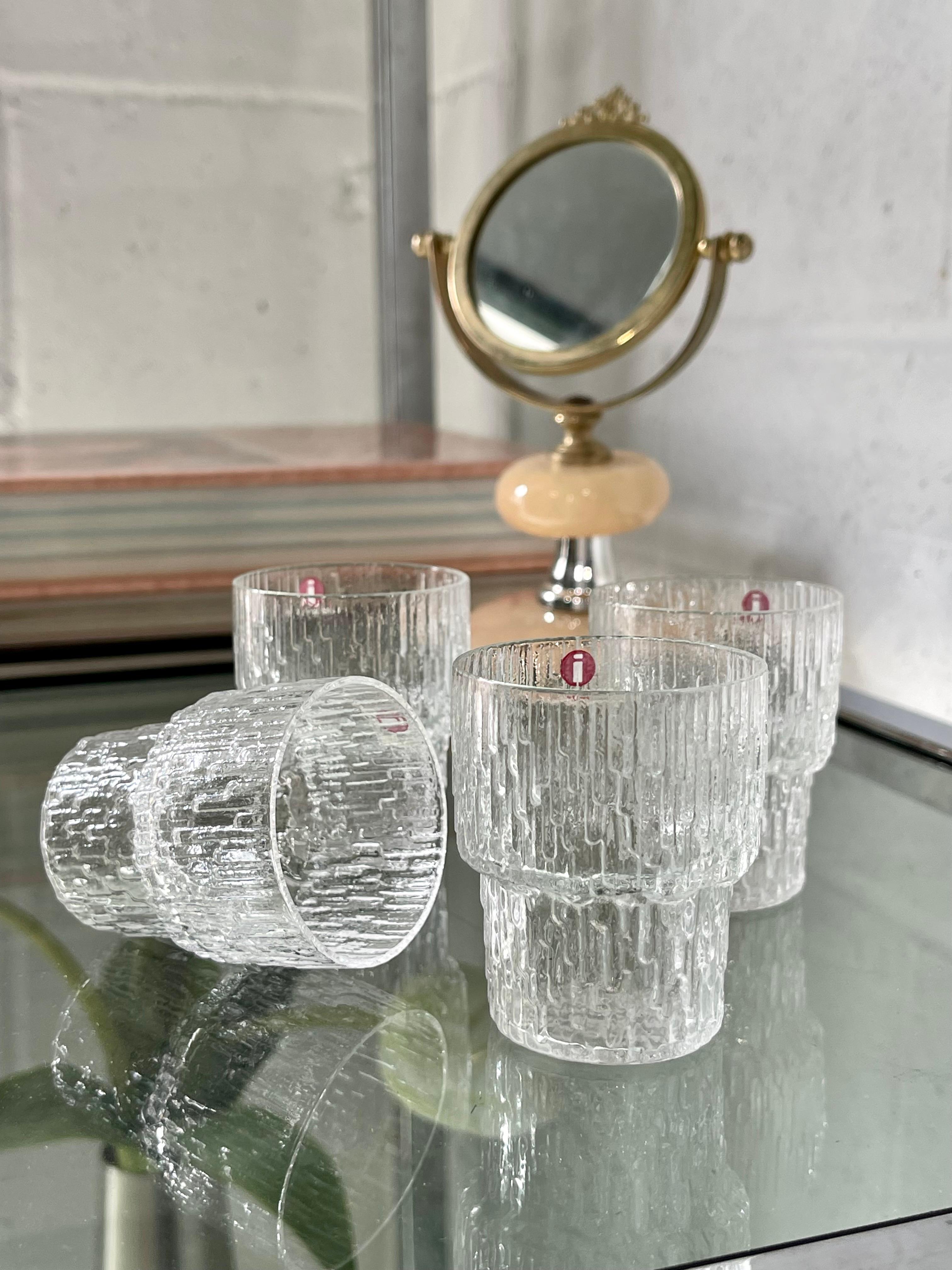 Dazzling set of 4 iittala Finland shot glasses. Designed by Tapio Wirkkala for the glass series Paadar, circa the 1960’s. 

Eye catching, brutal-esque design, which seems to be mimicking columns of melting glacial ice. 

In fantastic vintage