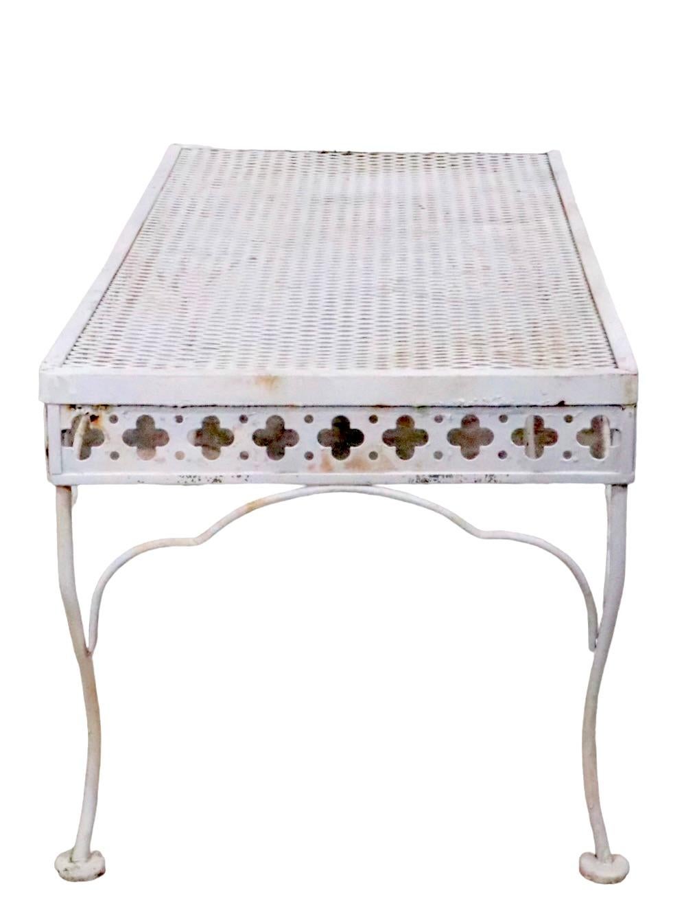 Chic vintage Taj Mahal pattern  garden, patio, poolside coffee table , by Salterini. Hard to find the coffee table from this sought after series. 
 The table is in very good original, clean and ready to use condition showing only light cosmetic wear