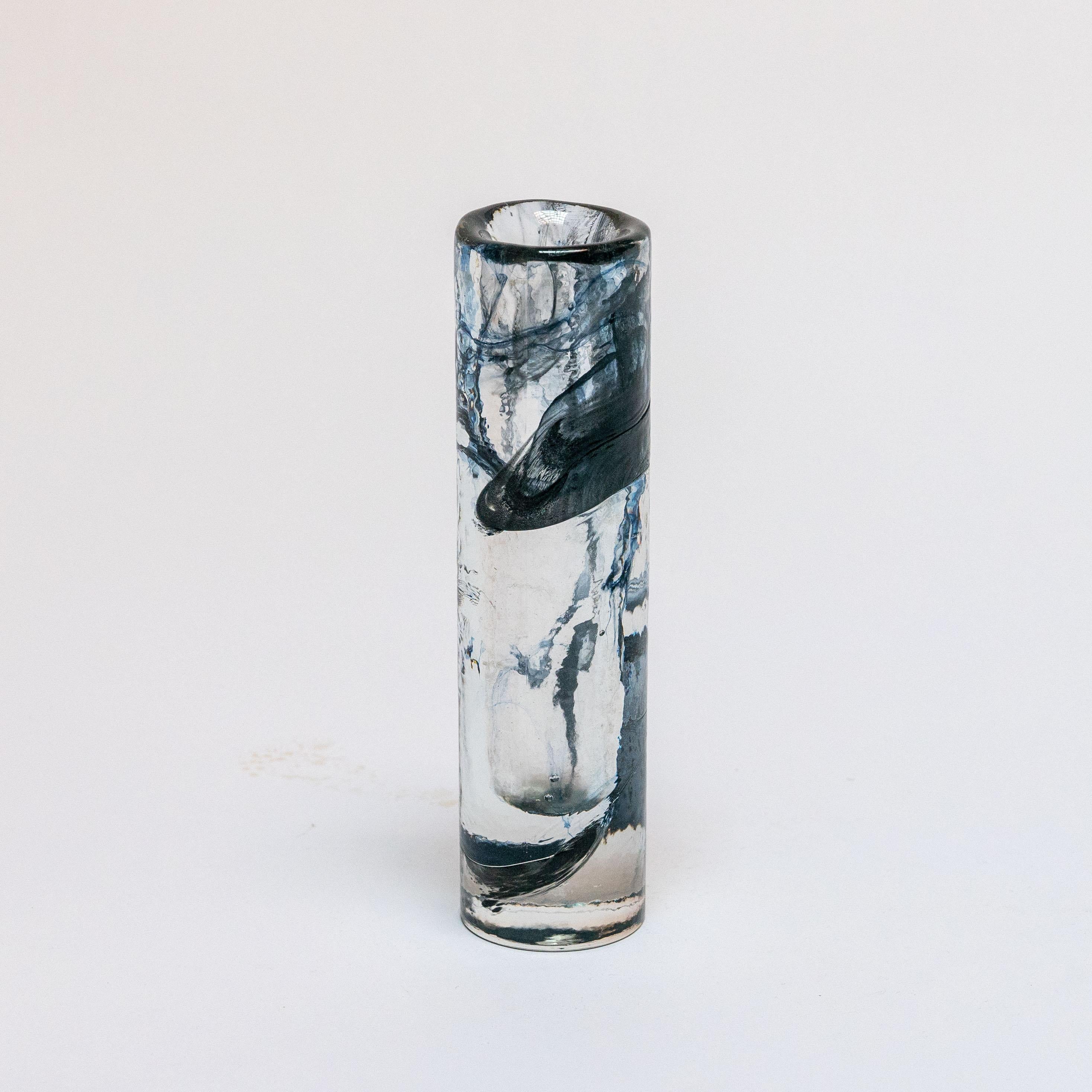 Have you ever put a drop of ink into a glass of water? Chances are, if you did, the result looked pretty much like this vintage Murano glass vase. Made of clear thick 