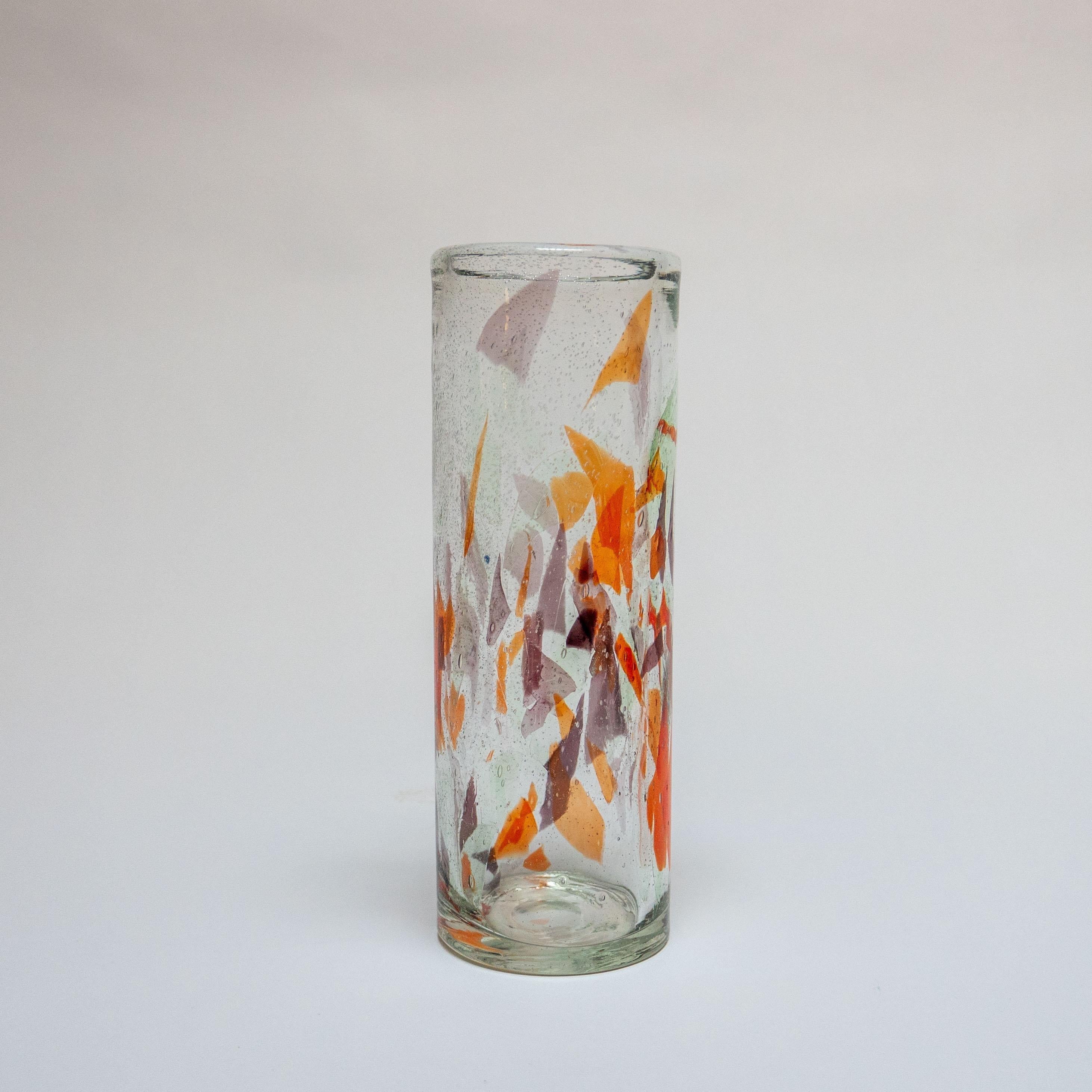 Confetti are a symbol of the world renowned venetian carnival, so in a way it only makes sense to find them (sort of) into another world famous craft product from the floating city. This vintage Murano glass vase has indeed inlaid shards of