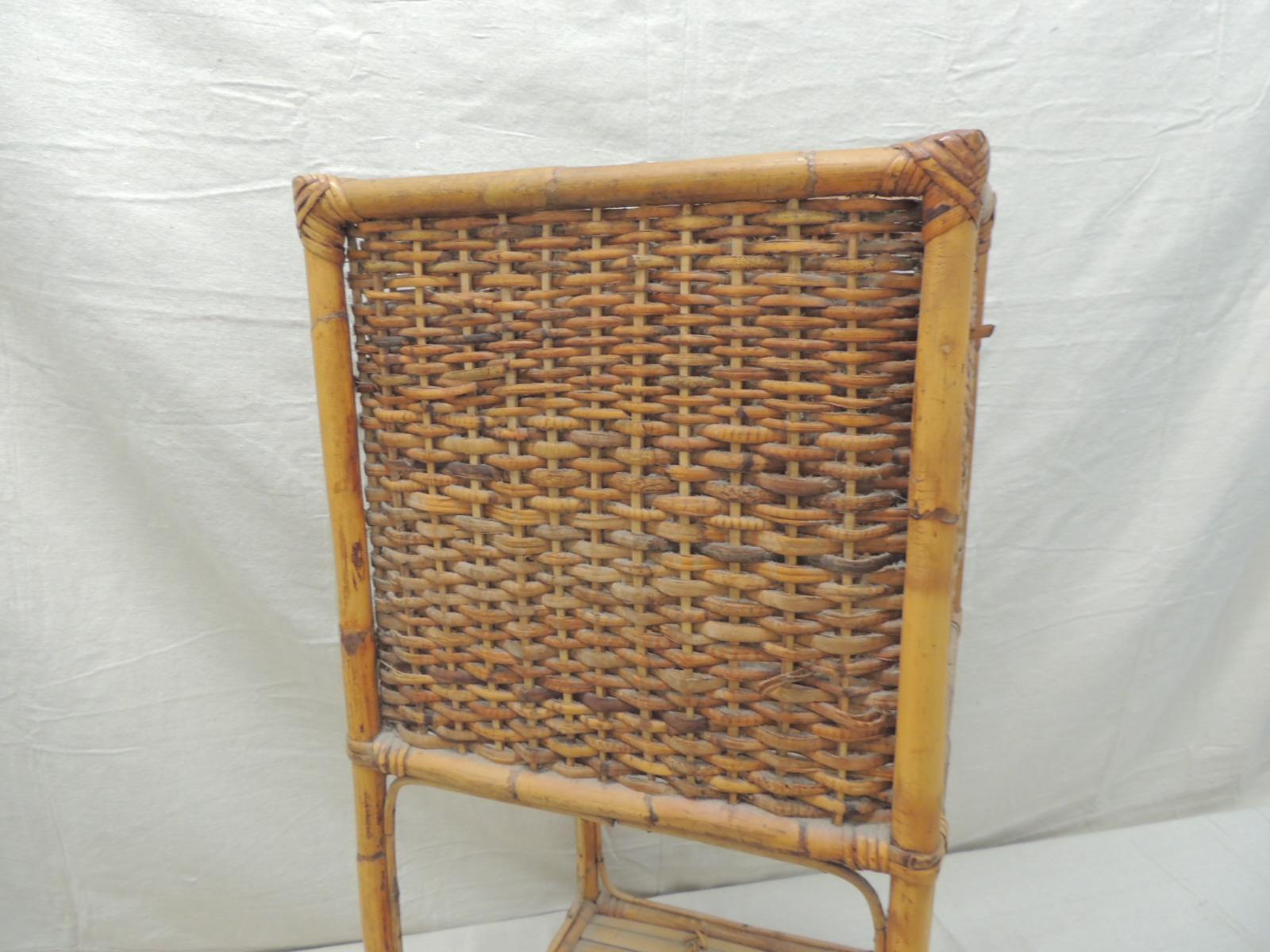 Vintage tall square bamboo planter
Square woven basket on the top and slotted bamboo floor shelf.
Size: 14.5” D x 14” S.W. x 30” H.
 