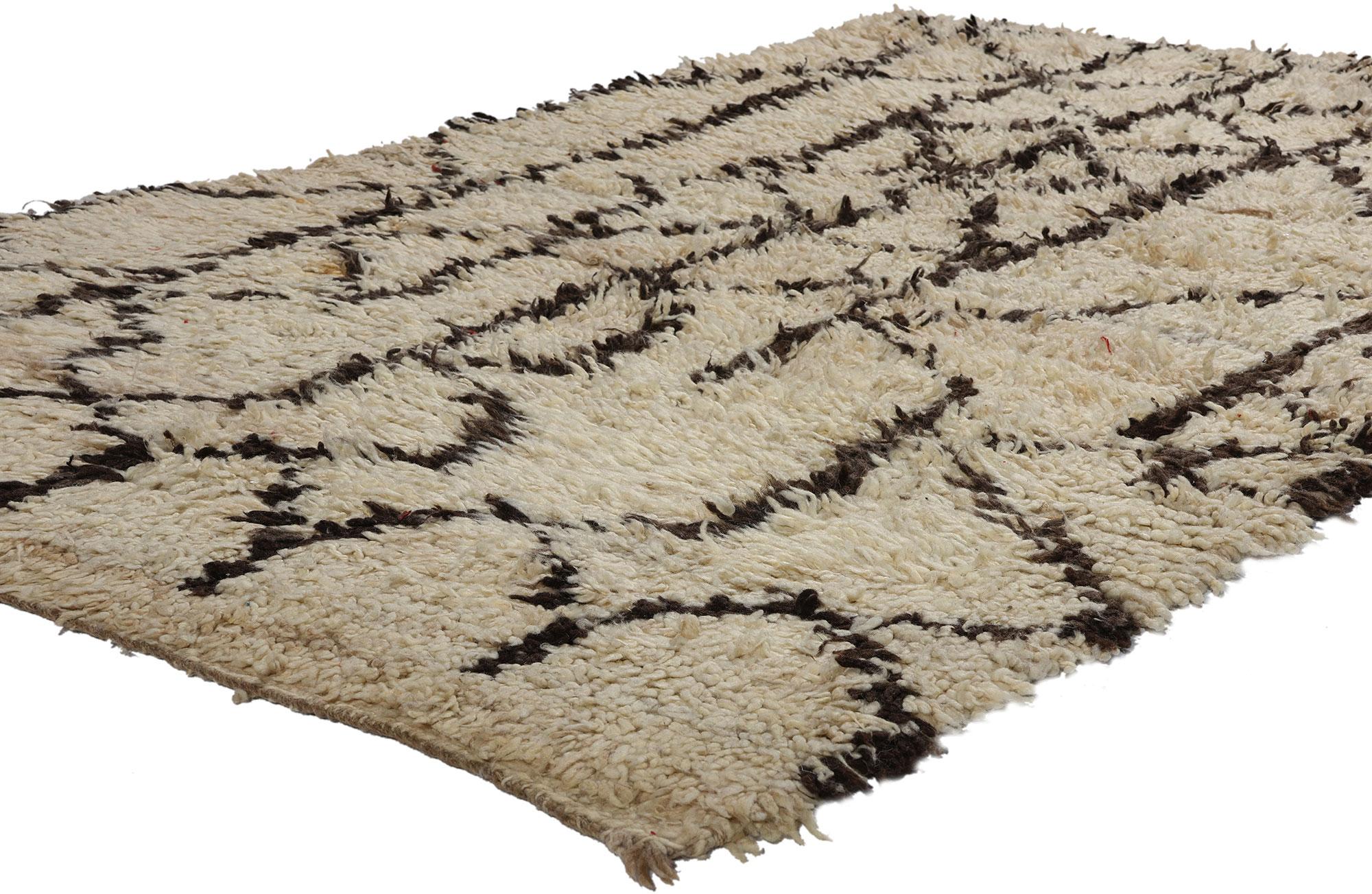 21808 Vintage Neutral Talsint Moroccan Rug, 04'02 x 06'10. Immerse yourself in the tribal enchantment of this hand-knotted wool vintage Talsint Moroccan rug, originating from the vibrant Figuig region in northeast Morocco, also known as Aït Bou