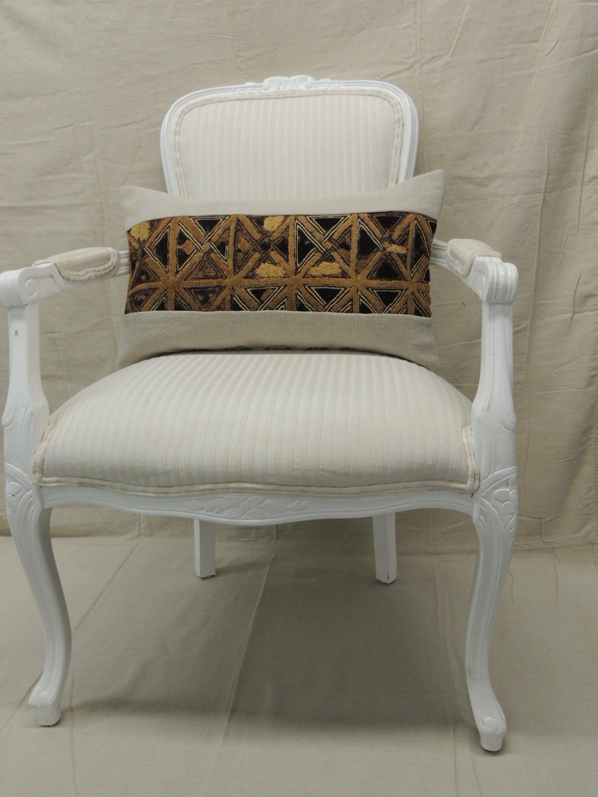 Vintage tan and black African Kuba lumbar decorative pillow
with weave woven natural linen frame and backing.
Decorative pillow handcrafted and designed in the USA. 
Closure by stitch (no zipper closure) with custom made pillow insert.
Size: 12