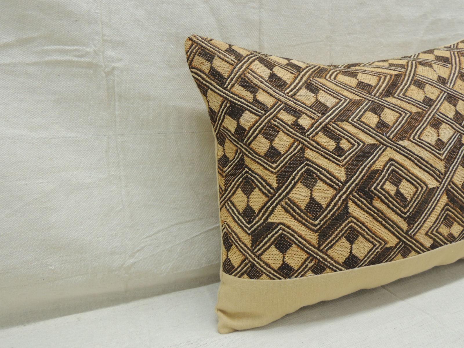Vintage tan and brown African Kuba decorative bolster pillow
with texture Yellow frame and same yellow linen backing.
Decorative pillow handcrafted and designed in the USA.
Closure by stitch (no zipper closure) with custom made pillow