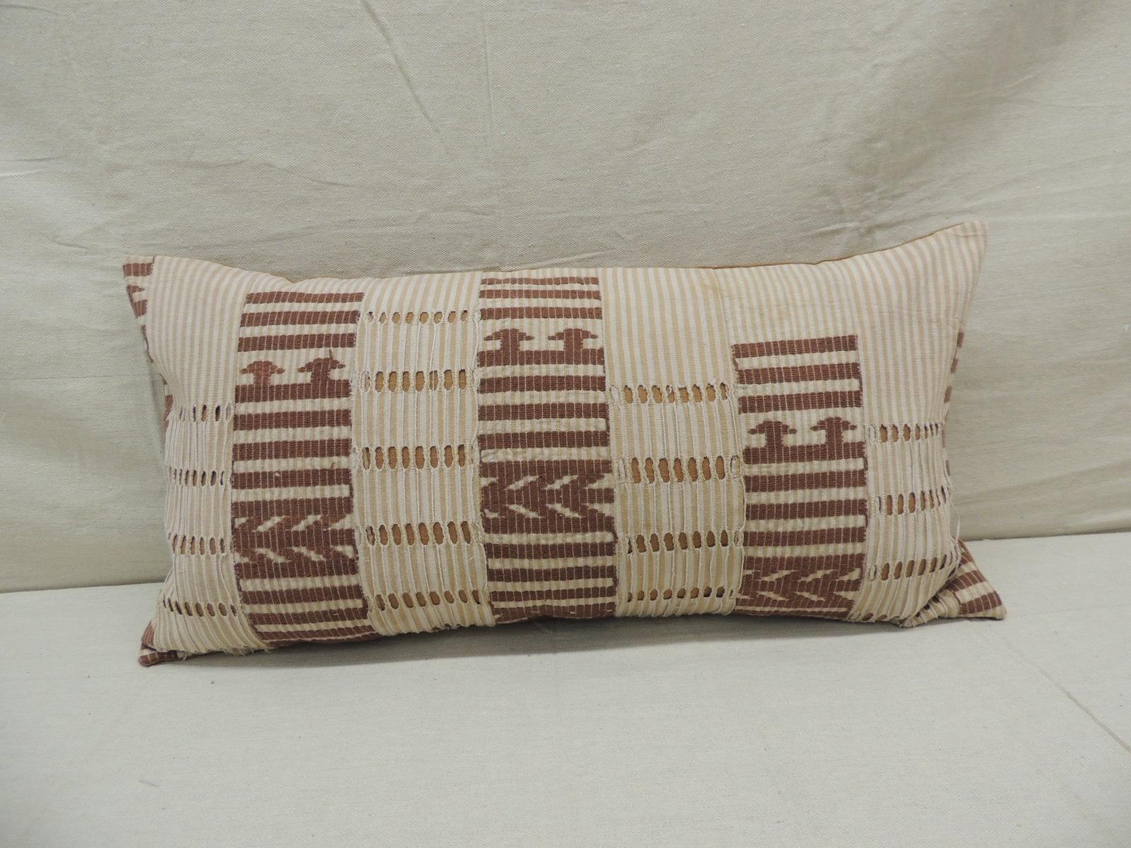 Vintage tan and brown woven ewe stripweaves African bolster decorative pillow
with yellow linen backing.
Decorative pillow handcrafted and designed in the USA.
Closure by stitch (no zipper closure) with custom made pillow insert.
Size: 25