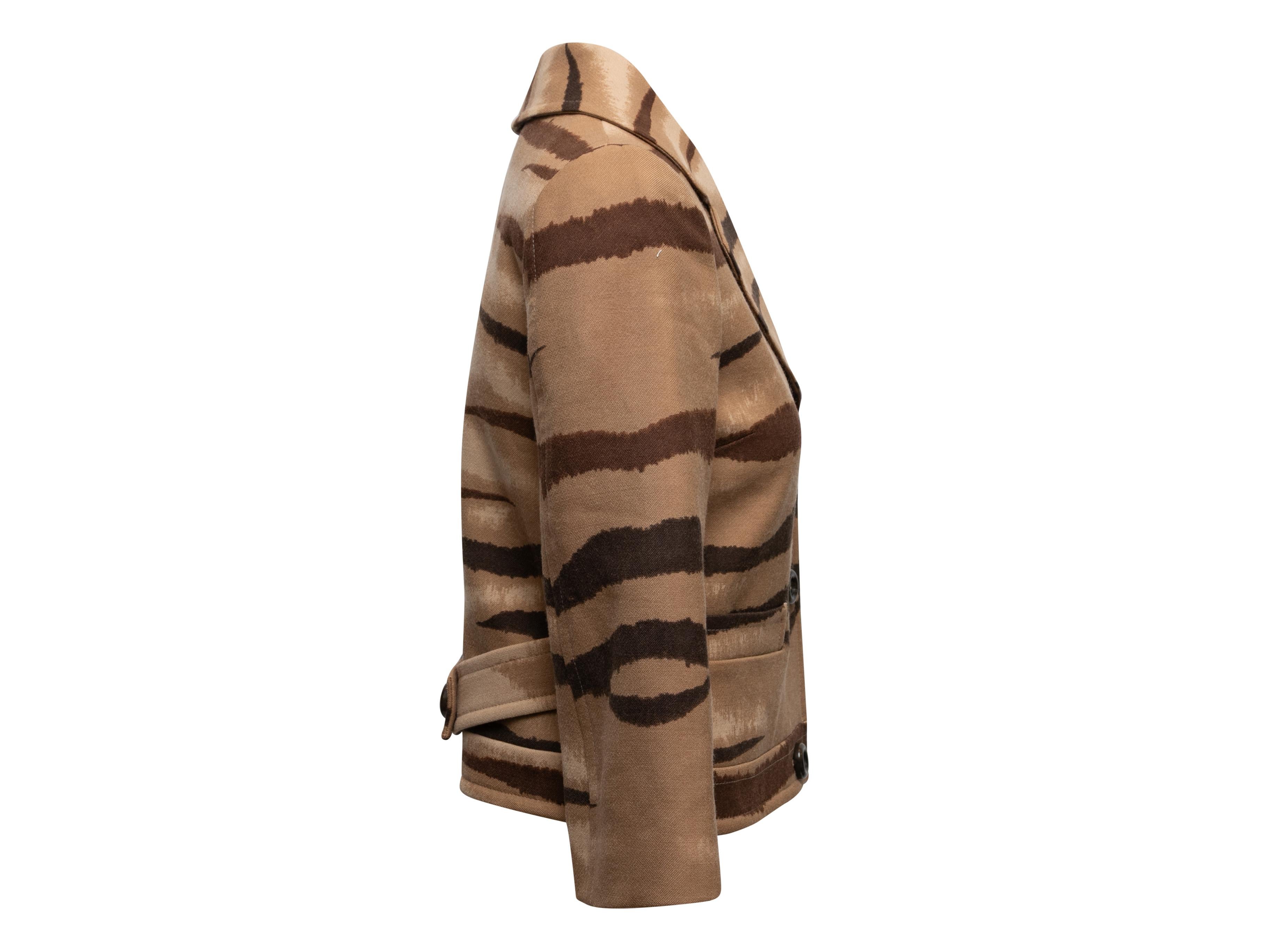 Vintage tan and brown animal print blazer by Valentino. Notched lapel. Dual hip pockets. Button closures at front. 36