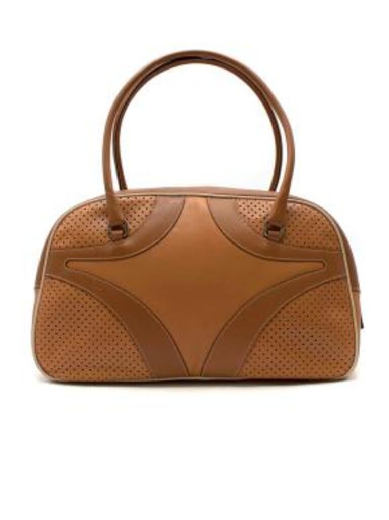 Prada Vintage tan leather Bauletto bag
 
 - Iconic bowling-style bag with rolled top handles and decorative perforated leather corners 
 - Top zip opening
 - Contrasting cream piping 
 - Logo jacquard lining 
 
 Material:
 Leather 
 
 9 very good