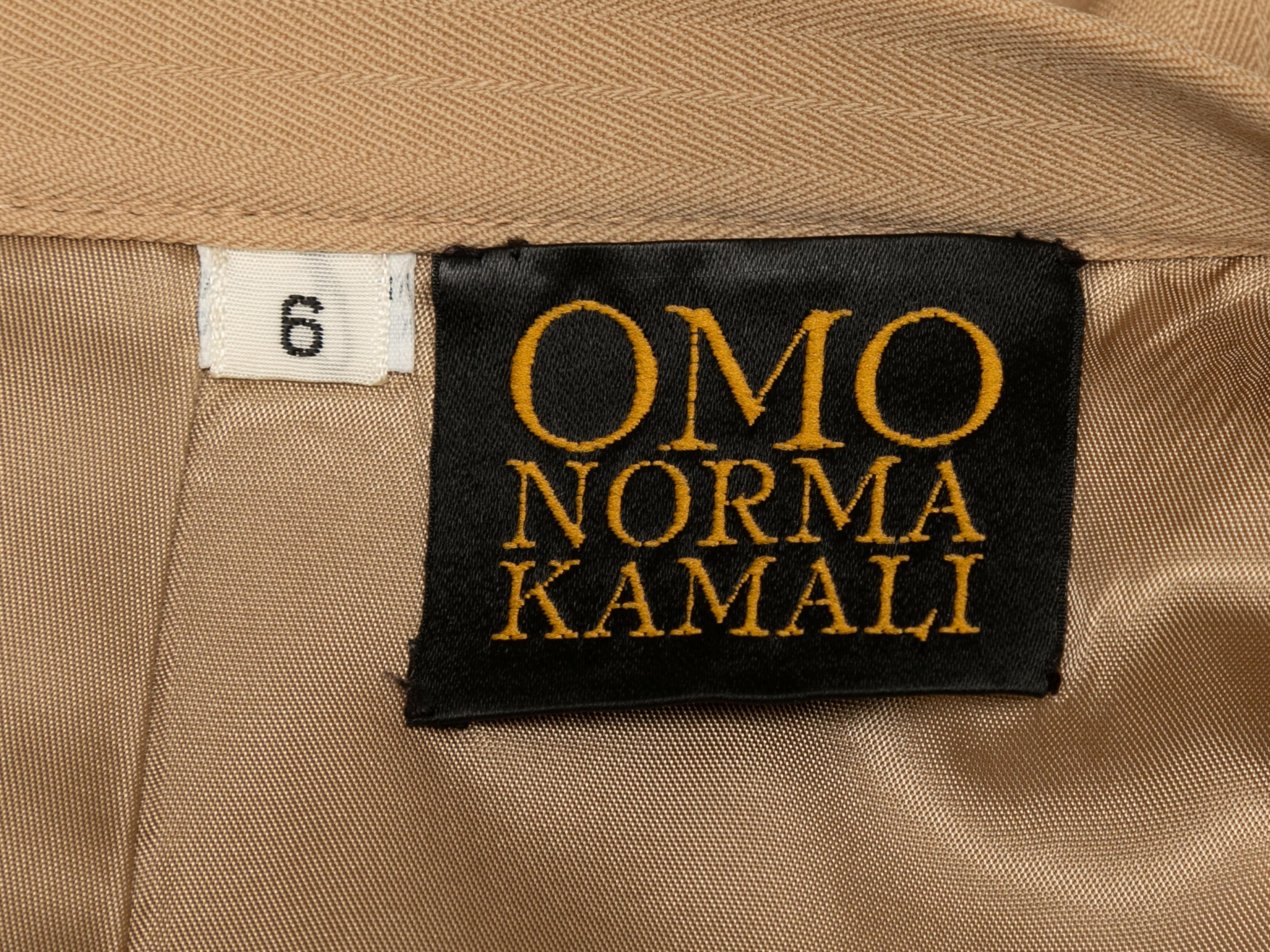 Vintage tan pencil skirt by Omo Norma Kamali. Circa 1980s. Zip closure at back. 26