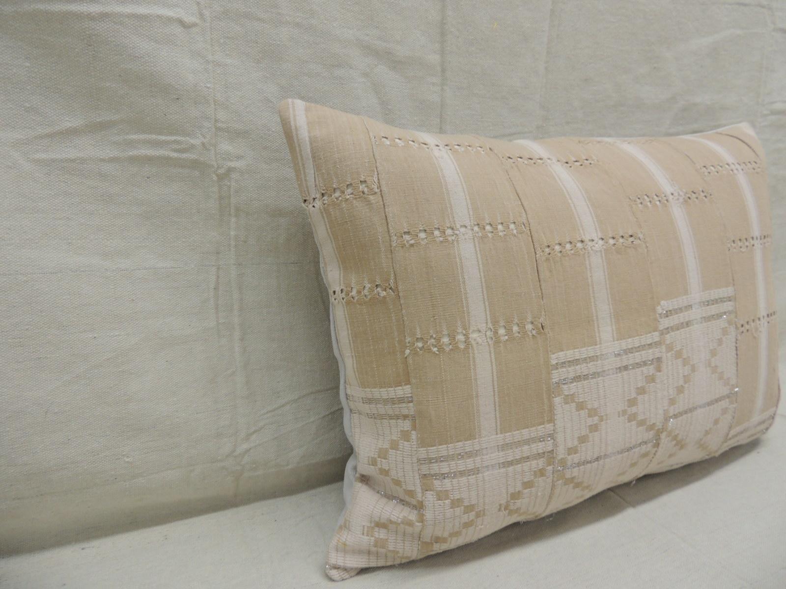Vintage tan and brown woven ewe stripweaves and white embroidery African long bolster
decorative pillow with silver embroidered metallic threads.
with textured grey cotton backing.
Decorative pillow handcrafted and designed in the USA.
Closure